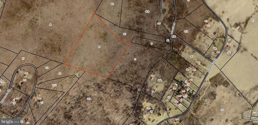 15.63 +/- acres, located at the top of Round Hill, call for information about access, the property will be sold with deed restrictions against building at the top of the hill.