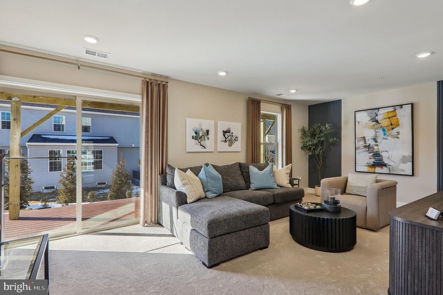 Located in Caruso Homes' Manning Square Towns community, this townhome at 16625 Aruba Dr offers modern finishes and functional living across three levels. The open concept main level creates an inviting space for both everyday living and entertaining. The great room features an electric fireplace with accent trim wall and flows directly into the kitchen. The kitchen features an expansive grey center island, stone countertops, classic shaker-style cabinetry, and stainless steel appliances. 

Upstairs, the spacious primary suite provides a private retreat with an en-suite bathroom and generous walk-in closets. Two additional bedrooms and a convenient upper-level laundry room complete this level. Oak staircases throughout add a timeless design element and elevate the home’s craftsmanship.

The finished lower level includes a recreation room, full bathroom, and storage room, offering flexible space for guests or entertainment. Energy-efficient features and a comprehensive builder warranty provide comfort and peace of mind. Interior photos are of a similar plan and are for representation only. For more information, please contact Caruso Homes directly.