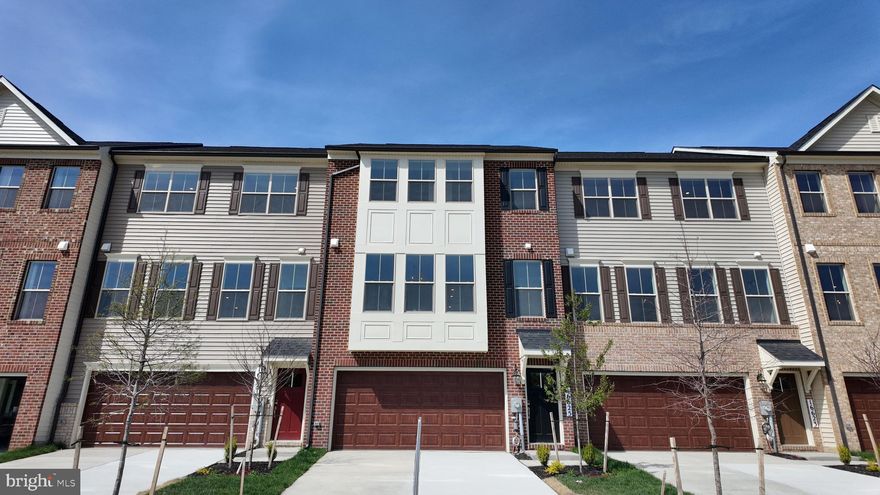 Located in Caruso Homes' Manning Square Towns community, this townhome at 16625 Aruba Dr offers modern finishes and functional living across three levels. The open concept main level creates an inviting space for both everyday living and entertaining. The great room features an electric fireplace with accent trim wall and flows directly into the kitchen. The kitchen features an expansive grey center island, stone countertops, classic shaker-style cabinetry, and stainless steel appliances. 

Upstairs, the spacious primary suite provides a private retreat with an en-suite bathroom and generous walk-in closets. Two additional bedrooms and a convenient upper-level laundry room complete this level. Oak staircases throughout add a timeless design element and elevate the home’s craftsmanship.

The finished lower level includes a recreation room, full bathroom, and storage room, offering flexible space for guests or entertainment. Energy-efficient features and a comprehensive builder warranty provide comfort and peace of mind. For more information, please contact Caruso Homes directly.