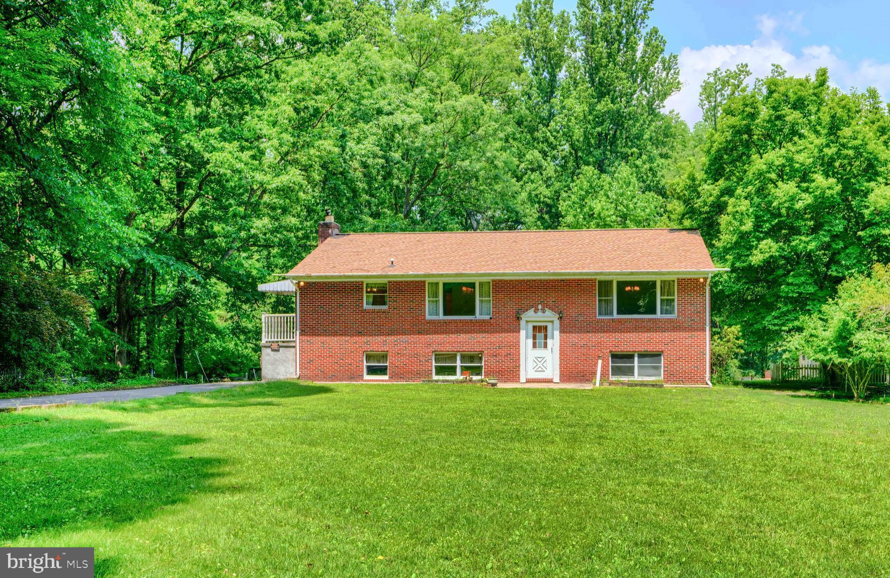 PRICE IMPROVEMENT! Welcome home to this extremely unique opportunity to create something truly special! This encompasses two lots, 3743 and 3741 Schroeder Ave, providing over 2 acres total. Property backs directly to Gunpowder State Park at the end of a long quiet drive. Talk about privacy and the chance to build a dream compound! The potential here is endless. Primary home is a huge space with four BR upstairs featuring a large eat-in kitchen. Primary bedroom provides an en-suite to go along with the hall bath. The lower level is open and bright, and could be an in-law suite if needed, with another full kitchen and full bath with accessible roll-in shower. Also features a convenient and useful lower level sunroom/patio area. The adjoining property at 3741 provides a potential ADU or in-law home - buyer responsible for all due diligence on that home and potential uses. Huge open space on the two properties provide ample opportunities for your outdoor activities and ideas. Check out the sheds and workshop as well. You get seclusion and privacy that is moments away from everything Perry Hall has to offer. Bring your imagination, bring your designers, and create a home and a lifestyle. It's a good life!