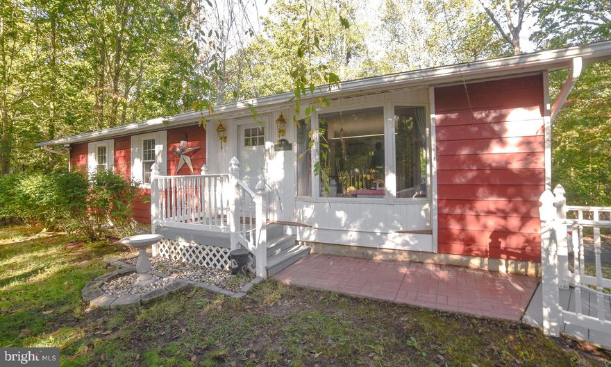 Nestled amidst a serene tapestry of nature, this adorable rambler unveils its timeless elegance and inviting ambiance. Boasting a total of four bedrooms and two and a half baths, this rambler basks in comfort and practicality. The main level enchants with three bedrooms and one and a half baths, creating an ideal living space. The open floor plan seamlessly integrates the living room and kitchen, fostering a sense of togetherness and ease. A gas fireplace serves as the centerpiece of this social haven, evoking warmth and intimacy on chilly evenings. The upgrades in this home are plentiful and impressive. A new roof in 2020 ensures peace of mind and protection from the elements, while a new HVAC system in 2019 guarantees year-round comfort. The addition of new rear gutters, a new deck, and a new sump pump in 2018 showcases the owner's attention to detail and commitment to excellence. Furthermore, new basement windows in the same year infuse the living spaces with natural light, creating an airy and inviting atmosphere. The allure of this enchanting rambler extends beyond its interior, as a spacious deck beckons you to immerse yourself in the sylvan beauty that surrounds. Coupled with the feeling of residing in a secluded treehouse, this outdoor oasis becomes a sanctuary of tranquility and solace.  Schedule a tour and unlock the potential that awaits you in this remarkable property!