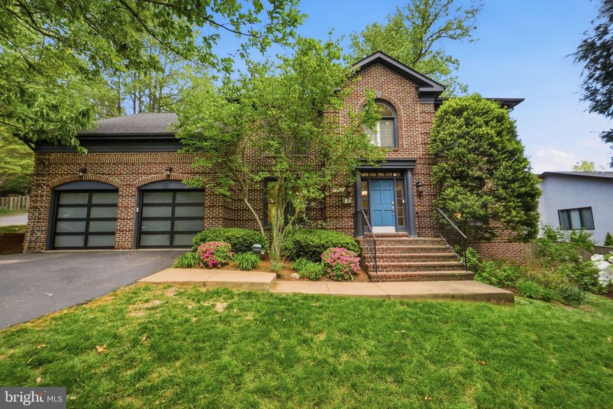 Exceptional North Arlington residence on a rare 0.37-acre lot, offering nearly 6,000 sq ft of thoughtfully designed living space, minutes away from Georgetown and Downtown DC. This beautifully updated two-story home with a finished basement, located within a quiet and leafy cul-de-sac, blends a timeless and distinctive exterior with modern upgrades. Featuring 6 bedrooms, 4.5 baths, and multiple flexible living areas, including space for two home offices, and an expansive recreation basement level, the home provides versatility for today’s lifestyle. The broad wood deck flanked by a landscaped yard sets the stage for effortless indoor-outdoor living. Extensively improved with approximately $500,00 in renovations, the home showcases a designer kitchen featured in interior publications, updated systems, and high-end finishes throughout. The upper level is designed to maximize natural light, featuring high-efficiency sun tunnels. The kitchen features custom cabinetry, bespoke Venetian glass lighting, a wine bar, and refrigerated wine cabinets for 350 bottles, smart home features, and abundant storage. Additional highlights include a 2-car garage (new smart doors from 2025), updated HVAC systems (2025), energy-efficient windows, and professionally maintained landscaping with irrigation. Ideally located in the heart of North Arlington with easy access to DC, airports, major commuter routes, and parks, this home offers space, privacy, and convenience in Lorcom Grove, one of the area’s most sought-after neighborhoods. A rare opportunity to own a renovated, large-lot home in prime North Arlington—where space, location, and quality converge.