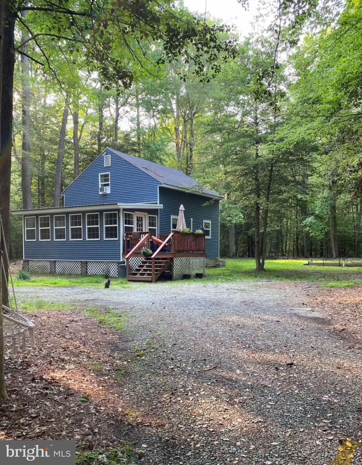 Tucked away on 14.93 serene acres, this delightful 2-bedroom, 1-bath home offers a peaceful retreat surrounded by nature. The property features an additional finished room upstairs—perfect for a home office, playroom, or creative space to suit your needs.
Whether you're looking to enjoy the sights and sounds of the outdoors, explore your own wooded trails, or simply relax in a private setting, this property delivers a unique opportunity for those who appreciate quiet living. Located just 15-20 minutes from shopping, dining, and amenities in Princess Anne and Pocomoke, you’ll have the convenience of town life within easy reach while enjoying the tranquility of your own natural haven.
Don't miss this rare chance to own a spacious slice of Somerset County countryside.
