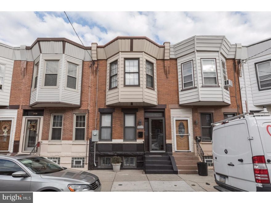 Welcome to 2533 E Indiana Ave, an extremely charming 3 bed, 2 full bath Port Richmond row that has been meticulously renovated, located in the heart of this amazing neighborhood! When you enter you will be greeted by the natural-light-filled first level which includes the living room, dining room, kitchen, and laundry room. The space is highlighted by beautiful solid hardwood floors that continue throughout, along with recessed lighting, high ceilings, and above door transom. The state-of-the-art kitchen includes white shaker style cabinetry with perfectly paired countertops, along with subway tile backsplash, stainless steel appliance package and ultra-desirable breakfast bar. Spacious tiled laundry room to the rear of the main floor which leads out to the large cemented rear patio. Upstairs you will find 3 generously sized bedrooms with closet space as well as the full hall bath with high level fixtures. Fully finished basement which has enough space and great layout for a variety of uses and also contains another very spacious full bath. This is an incredible rehab, you won't want to miss your opportunity to own this gem!