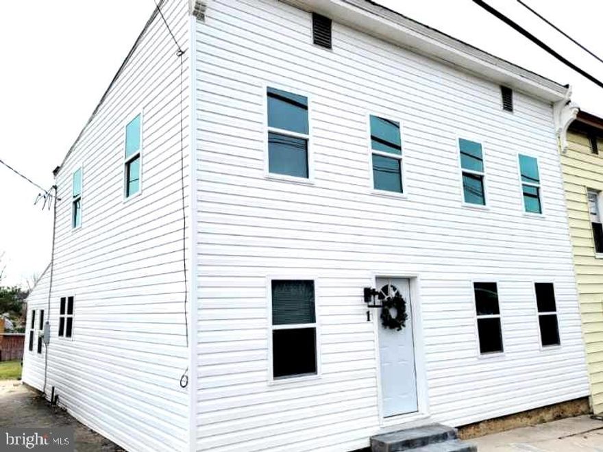 Recently renovated 4 bedroom 2 bath home  in Smithsburg, MD! Enjoy a brand new kitchen and two full baths.  First floor laundry and bedroom.  New siding, windows, and  gutters. New central HVAC and water heater. Plumbing and electrical are also all new.  Even the basement has been completely restored with a fresh concrete floor, sump pump system, paint and insulation.  Mud/sunroom opens up to the fully fenced back yard. Close to schools and park.
