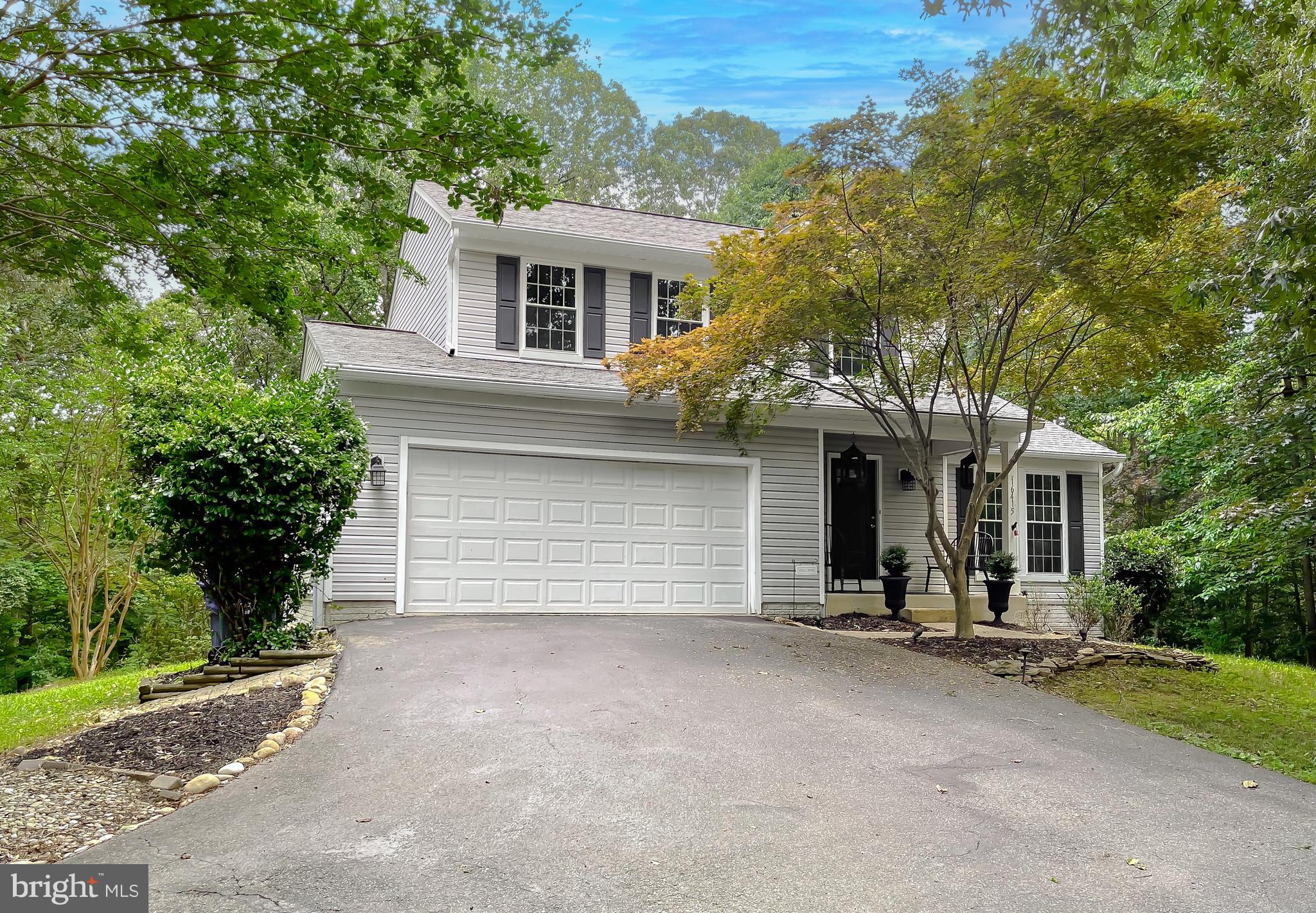 Welcome to 16415 Triple Crown Court – A Hidden Gem in Carriage Crossing!
Tucked away in a quiet cul-de-sac in the sought-after Carriage Crossing community just off Route 231, this beautifully maintained 3-bedroom, 3.5-bath home offers the perfect blend of comfort, style, and functionality—set on a private and peaceful 1.12-acre lot backing to trees.
The main level welcomes you with solid hardwood floors, modern brushed nickel light fixtures, and a bright, open layout ideal for both everyday living and entertaining. The updated kitchen features quartz countertops, white cabinetry, a gray painted island, stainless steel appliances, and a stunning marble layered backsplash. Just off the breakfast nook, the sunroom adds beautiful natural light and provides a relaxing spot to enjoy the scenic backyard views.
From the sunroom, steps lead to a spacious paver patio, making this home an entertainer’s dream for year-round hosting—BBQs, gatherings, or quiet evenings under the stars.
The updated powder room includes a vessel sink, storage vanity, and gorgeous textured modern wallpaper.
Upstairs, the primary suite offers a walk-in closet with custom organizers and a recently updated en suite bath with LVP flooring, double sinks with quartz countertops, modern lighting, and sleek black fixtures. Two additional bedrooms and a full hall bath complete the upper level.
The finished walk-out lower level features new LVP flooring, a full bathroom, and a laundry area with a butcher block folding station. There's also ample storage space throughout.
Additional upgrades and features include:
Updated HVAC (2024)
New water heater (2024)
Fully insulated garage (2022)—ideal for a workshop or hobby space
Driveway sealed (2023)
Attached 2-car garage with TV mount and workspace setup.
Located in a commuter-friendly area with easy access to Washington, D.C., PAX River Naval Air Station, and Andrews AFB, this home truly checks every box.
Back on the market—previous buyer financing fell through! Don’t miss your chance to own this thoughtfully updated and beautifully maintained home at 16415 Triple Crown Court. Schedule your showing today!