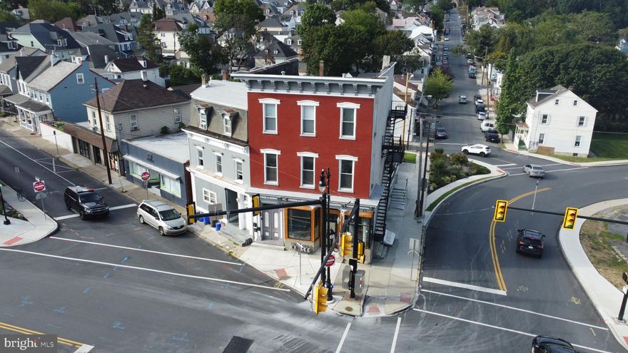 Newly renovated corner lot building in Easton. 3 residential units and restaurant storefront. Walkable distance to the historic Downtown Easton, amenities, restaurants, and shopping. Brand new roof, water boiler, zoned mini-splits, windows, flooring, and fresh paint! The storefront has been fully framed, new bathroom, and exterior canopy. Each residential unit is 1 bedroom 1 bathroom, walk-in shower. A charming landscaped corner garden was developed at the intersection; this enhancement significantly elevates the aesthetic value of the property and improves the neighborhood's overall appeal which is all part of the City of Easton's Beautification Initiative which started in 2024. This is the prime location to accentuate the Initiative.  All residential units and billboard are currently leased, providing revenue.