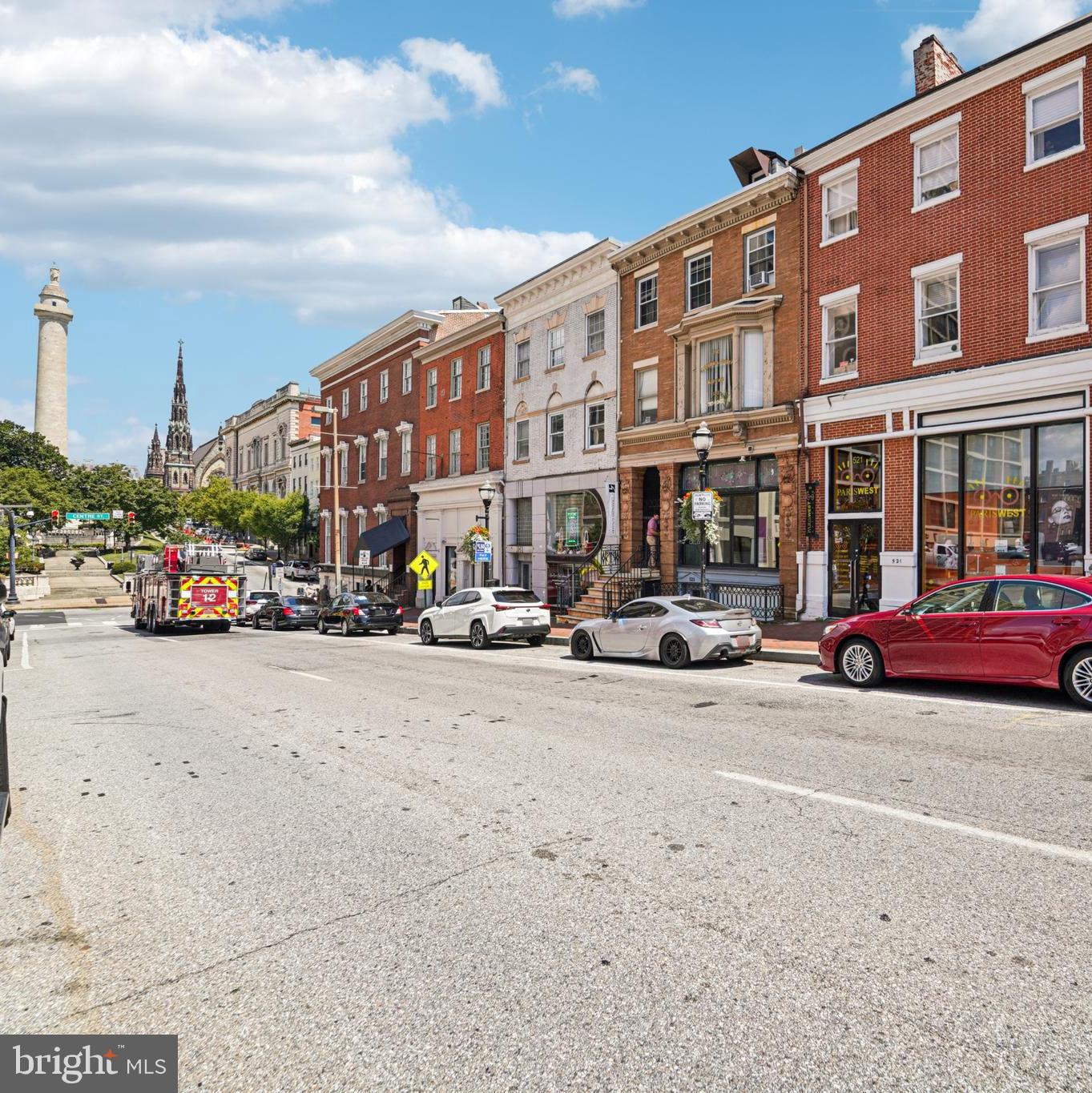 Own a piece of Baltimore history in Mount Vernon, just a block away from the Washington Monument, the Baltimore Cathedral and the future home of the district court. With almost 6,000 finished square feet, this property is setup as 4 seperate units with parking for up to 6 vehicles (3 without tandem parking). This well maintained property is ready for its first new owner since the 1970’s. The main level is a beautiful gallery space, currently leased through the end of the year. The open space features hardwood floors, a half bathroom, air conditioning, and an office space, with direct access to the parking pad. The 2nd floor has been a meeting room for a private club since the 1930's. This unit offers hardwood floors, an office, a kitchenette, a half bathroom, and air conditioning. The third and fourth floors have been combined to create a 1650 square foot move in ready 2 bed, 2 bath apartment, complete with updated bathrooms and kitchen. The owner combined the 4th floor studio unit with the 3rd floor. The next owner could separate the two by just moving a door, making a 5 unit building to increase income. The finished lower level is being leased by the gallery as storage, but had been rented to a retail space in the past, with direct access from Charles Street. Each unit has its own water heater, electric meter, bathroom (full or half) and electric panel/ breaker box on each level. The large boiler in the sub-basement provides heat for the building and water is shared among the tenants. Mount Vernon is centrally located with lots of transportation (Penn Station offers Amtrak trains and express trains to DC), bike lanes, public parks, restaurants , bars, and nightlife, Mount Vernon is the cultural hub of Baltimore. Start your business or start earning rental income with this beautiful piece of Baltimore History.