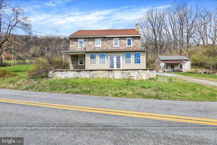 Charming Country Farmhouse with Scenic Valley Views

Escape to the tranquility of country living with this character-filled 3-bedroom, 2-bath stone farmhouse set on over 1.5 acres of picturesque land. Brimming with charm and opportunity, this property offers a peaceful setting with room to make it truly your own.

✨ Property Highlights:

Authentic Stone Farmhouse: Timeless character with rustic appeal
3 Bedrooms | 2 Bathrooms with a comfortable, functional layout
First-Floor Laundry: Conveniently located for everyday ease
Updated Kitchen: Features a gas stove, renovated countertops, and a dedicated dining area
Walkout Basement: Ideal for storage, workshop space, or future finishing potential
Attic Storage: Additional space for seasonal or long-term needs
200 Amp Electrical Service
🚜 Outbuildings & Land:

Carriage House: Perfect for storage, workshop, or hobby use
Newly Constructed Pole Barn with loft: Great for Vehicle / yard equipment storage or extra workspace
Expansive Lot (1.5+ Acres): Plenty of room for gardening, recreation, or expansion
🌄 Outdoor Features:

Scenic Valley Views: Enjoy peaceful surroundings and beautiful natural vistas
Front Enclosed Porch: Upgraded with new windows—perfect for relaxing year-round
🔨 Opportunity Awaits:
Several improvement projects have already been started, offering a fantastic opportunity to add your personal touch and build equity.

This unique property blends rural charm, usable land, and exciting potential—ideal for those seeking a country lifestyle with convenience and character.

📞 Schedule your private showing today!