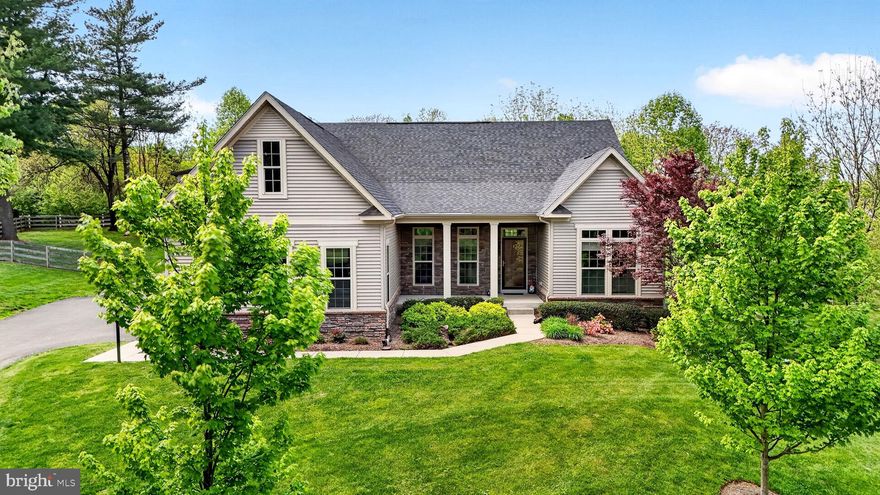 Stunning, like new, 3BR/2BA Rancher home nestled into the landscape on this 1.5 acre lot in a beautiful neighborhood  Lush green lawn and landscaping greets you as you pull into the driveway in front of the three-car garage.  Home is filled with natural light, a soft color palette, high ceilings, recessed lighting, and luxury & durable engineered wood flooring.  The main floor living space features the open concept floor plan homeowners seek, ideal for entertaining and a growing household, including a large family room with a gas fireplace, a stunning kitchen, and sunroom dining area.  The kitchen features plenty of cabinets finished with crown moldings, a separate pantry closet, granite countertops with a tiled backsplash, and stainless steel appliances including a gas cooktop and a double wall oven. A stainless sink is set into a large island with pendant lights and breakfast seating. When you enter the main hallway, a spacious home office is behind glass French doors on the left and two spacious secondary bedrooms and a full bath are on the right.  The primary is set separately from the rest of the bedrooms offering a grand sized bedroom with a tray ceiling, a private en suite with a large walk-in shower and a double sink vanity, and a large walk-in closet. Completing the main floor is a laundry room with access to the garage. There is an unfinished lower level for you to double the living space for your family with a walk-out to the fenced yard.  From the sunroom, step outside to the paver patio with built-in firepit overlooking the sprawling back yard; perfect for dogs, kids, and all the yard games during the summer get togethers. Highlight of the property is the 50'x25'  Morton building with a 6"+ thick concrete floor and 50 amp electric service, ideal for storing larger items like a boat, RV, or car. This move-in-ready home is ideal for any new homeowner and is located near shopping, restaurants, and commuter routes, yet keeping the countryside living sense of peace and calm.