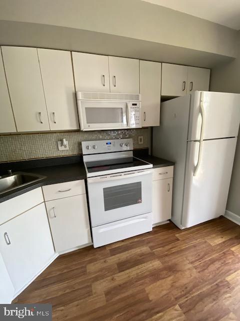 Water Included! This light filled penthouse condo includes 2 spacious bedrooms, full bathroom, and second half bath, large living/dining/kitchen, balcony, central A/C, and in unit washer/dryer., walk-in closet, and more! Conveniently located to shopping, restaurants, Franklin Square hospital and 695. Application fee is $40 per person. Minimum credit score requirement is 620. Total Household Income must be 3 times monthly rent. No pets.