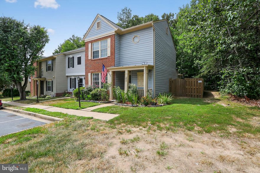 Well‑maintained end‑unit townhouse, built in 1989, offering 1,312 sq ft with 2 bedrooms and 2.5 bathrooms. Features modern vinyl plank flooring on the main level and new neutral carpet upstairs. The large eat‑in kitchen includes stainless steel appliances and new granite countertops. The main level also hosts a dining area, cozy family room with fireplace, and a half bath. Upstairs includes two primary suites, each with full bath; the owners’ suite has a vaulted ceiling and walk‑in closet. Recent mechanical updates include newer water heater, furnace, and AC. The fully fenced backyard backs to trees and includes two assigned parking spaces. Convenient to I‑95, Quantico VRE station, shopping, and commuter routes. HOA provides maintenance of amenities like pool, tennis courts, playground, and trash.