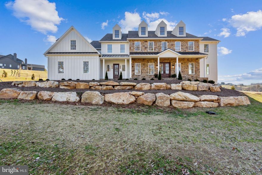 Quick Delivery! Exquisite, custom-built home situated on one of the most desirable parcels in Chester County. The lot is 1.4 acres overlooking preserved open space. This 5, 700 square foot home features a 10-foot ceilings. four-car garage, gourmet kitchen with additional prep kitchen, butler's pantry, dual first floor offices, foyer flanked by living and dining rooms, large mudroom and two powder rooms. High-end finishes include European white oak flooring, designer lighting, custom inset cabinetry, beverage refrigerator, ice maker, wine closet, extensive built-ins and millwork. Upstairs, you will find an owner's suite with pond views, two walk in closets and a luxurious marble bathroom with heated floors. Four additional bedrooms, each with their own walk-in closets and bathrooms, and a large laundry room complete this second story. Walk out basement has room for gym, bar and or theatre. Outside, the stone patio is sure to please you and your guests for evening sunsets and barbecues.
