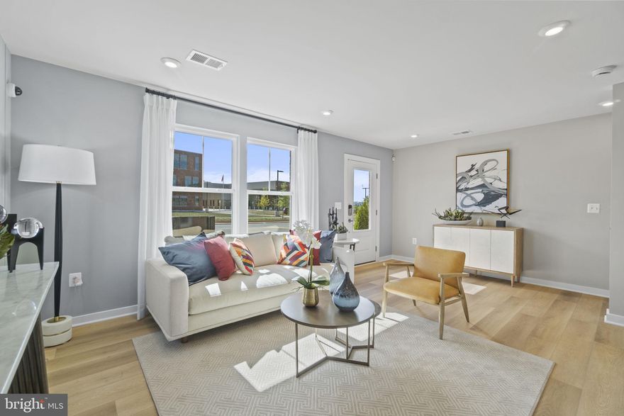 Immerse yourself in the perfect blend of entertainment and intimacy with this stunning Jenkins townhome. As you enter into the elegant foyer, your guests will be captivated by the inviting atmosphere that awaits.

Indulge your inner chef in the gourmet kitchen, complete with a large sit-down island that will delight both food enthusiasts and home chefs alike. The seamless integration with the dining area and spacious family room, adorned with an electric fireplace, creates a harmonious space for unforgettable gatherings.

After a long day, relax in your primary suite with a private en-suite bath and spacious closet. This peaceful retreat will help you unwind and recharge. Two more bedrooms down the hall provide cozy spaces for your loved ones, along with a full bathroom for everyone's comfort.

For the ultimate convenience, the lower level features a bedroom and bathroom suite, perfect for accommodating out-of-town guests. This thoughtful addition provides a welcoming space for visitors to feel right at home.

*Photos and tour shown are from a similar home