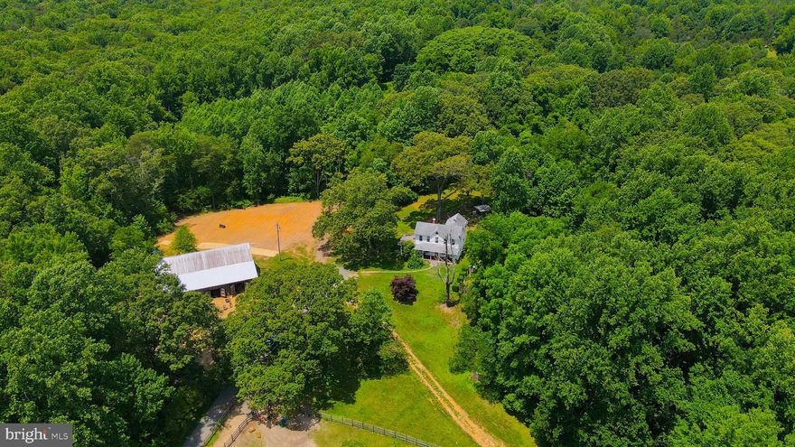 A RARE FIND! This is a one-of-a-kind property in Southern Maryland that is less than an hour from Washington DC. Beautiful renovated farm home on nearly 9 acres for pasture or other agricultural pursuits. Outbuildings and amenities, such as stables, barns, sheds, gardens and more. Two fenced pastures with one open pasture. Property includes a fenced chicken yard/dog run. Large tobacco barn has stables and a workshop/office with electricity and water. The barn is perfect for horses, storage and/or entertaining. Bring your horses, alpaca, chickens, goats and more! The main level features refinished hardwood floors, front staircase, living room with wood stove, dining room with exposed brick, updated kitchen with white cabinets, gas stove and French door refrigerator and private rear staircase to primary bedroom. Completely renovated large bathroom is located on the main level and features custom tile work and two vanities. The upper level features 3 spacious bedrooms with amazing views of the land. Updates throughout include newer windows, flooring, freshly painted, newer septic, deep well and more!  Historical details throughout the house. This is a gorgeous property that is serene and offers plenty of privacy with a secluded tree lined driveway. Beautiful lot, plenty of parking. Private home with views overlooking your pasture and wooded acreage. Situated on a very usable, gorgeous, 8.89 acre lot. The Farm is zoned USDA Property. Escape the city life and enjoy country living within commuting distance to the city. Close to shopping, restaurants, library and University of Maryland Charles Regional Medical Center. Conveniently located to Joint Base Andrews, Pentagon, Bolling, MD-5, I-495 Beltway, Washington, DC, Virginia, commuter bus lots and Metro station. Schedule a showing today!