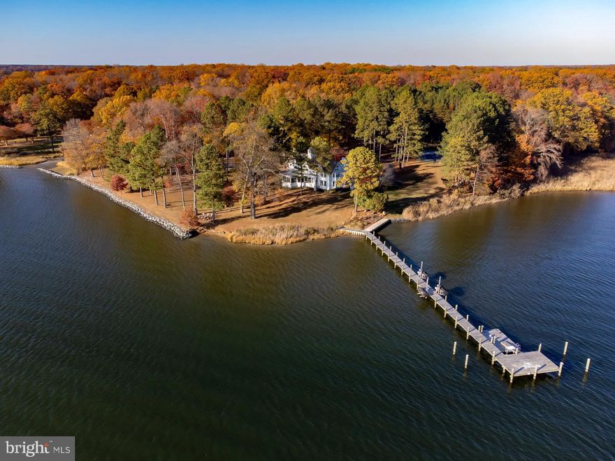 Welcome to this extraordinary 7 acre property with breathtaking views of the Wye River and Wye Island. The beautiful 4 BR home has been completely renovated and offers amazing water views from every room.  The open floor plan includes a gourmet kitchen, exceptional sunroom with oversized picture windows, high ceilings, 3 fireplaces, two staircases, and hardwood floors throughout. There's a full finished basement with large game and family room, exercise room, half bath, and incredible storage for kayaks which is easily accessible from underneath the deck. The primary suite has a gas fireplace and beautiful en-suite bath, and all the bedrooms have amazing water views, vaulted ceilings, and over sized windows. In addition there is a stunning 1 bedroom plus loft apartment over the attached 2 car garage which is great for guests. Extensive exterior work on the property was done by the current owners and includes a large new waterside gunite saltwater pool, brand new pier (deep water -6'MLW) with 3 lifts, floating dock, and resurfaced tennis court. The grounds are park like with great attention being taken to the shoreline, landscaping, and tree maintenance. Completely turn-key, this coastal retreat really has it all and provides the utmost in privacy and Eastern Shore living. Furnishings may be purchased separately.