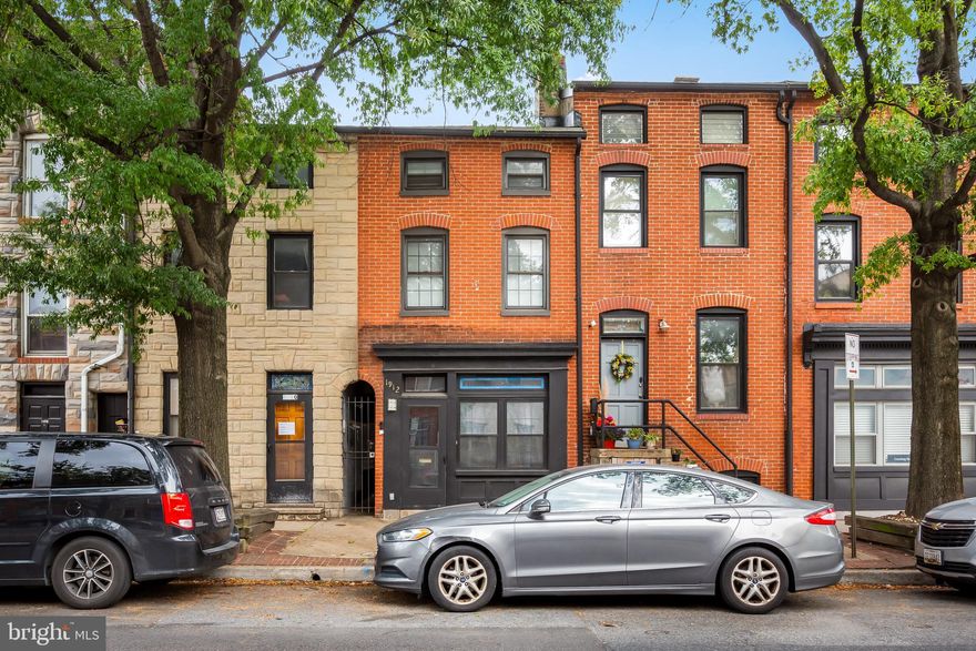 Easy living on Eastern Ave! Move-in ready, this UPDATED, bright 2 bedroom, upstairs apartment has plenty of room for living! NEW floors in bedrooms, on-trend white subway tile kitchen backsplash, and fresh paint throughout - this is your chance to be central to all things FELLS POINT while living in fresh new, central-city digs across from iconic Tochterman’s. Inquire about rear PARKING pad with periodically available spots to rent for an extra fee. Two floors with a bedroom and bathroom on each - full bathroom with tub next to laundry on main floor and a half bath upstairs. Main floor includes an eat-in bar, washer and dryer, private rear bedroom with walk-out deck, chic exposed, white-painted brick, tons of extra light of an interior rowhouse with extra windows in the back bedroom. Top floor suite is an open loft bedroom allowing for both bedroom and studio work-from-home space. Front living room situated off the kitchen and provides plenty of space for streaming, gaming, and entertaining. Location is key in historic Fells Point with the Harbor Promenade, restaurants, newly renovated Broadway Market, Pitango gelato and bakery, Water Taxi commuting to Locust Point, Greedy Reads, Hopkins, Post Office, Harbor East and Harbor Point shopping district, MAC gym, and nearby Canton with neighborhood mainstays and additions such as Verde, Cafe Dear Leon, One Do Coffee, Creative Alliance, Patterson Park, The Shops at Canton Crossing, Sprouts, Harris Teeter, Target, and newly expanded Merritt Athletic Club with a parking garage rooftop pool! You can truly live the city life on foot, bike, or with easy access to public transit!