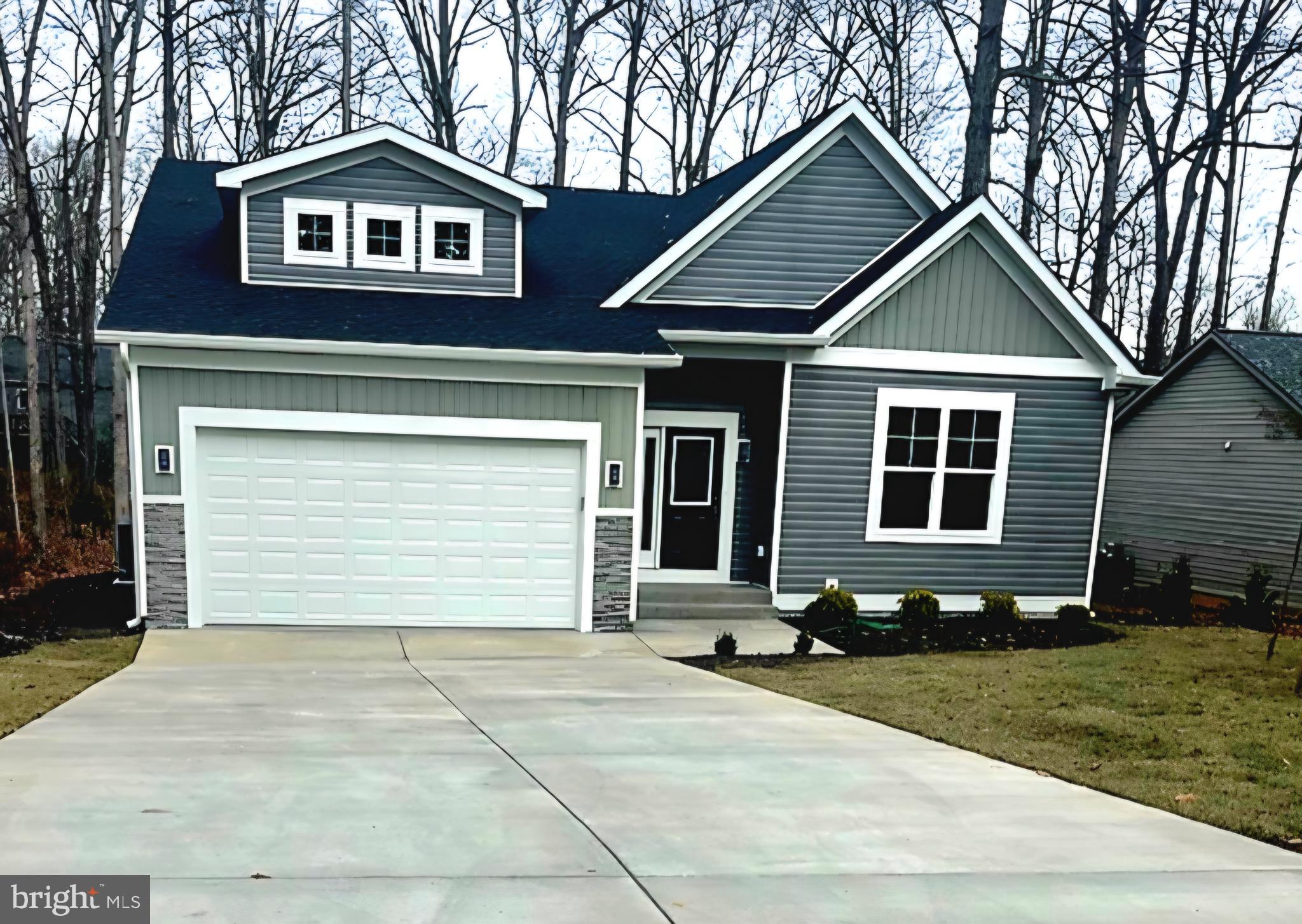 Your new dream home, construction completed! Brand new house in a beautiful gated community. Approximately 2,600 sq/ft finished living space plus 400 sq/ft 2 car garage! Large, open concept floor plan with plenty of upgrades included. Large deck with trex and vynil railings.