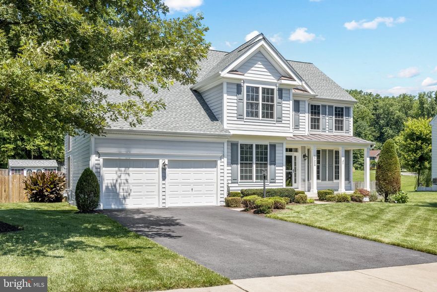 Welcome Home, owner has proudly taken care of this colonial house, This Amazing home features an elegant family room with soaring ceilings with lots of natural light with a beautiful 2 story stone gas fireplace, 2 new AC/Heating units, new floors, office/study room, front porch, kitchen quartz counters, stainless steel appliances, gourmet kitchen, 42 inch cabinets, crown molding, new lights fixtures, ceiling fans, fresh paint, new upper level railing, custom made shelving in main bedroom closets, main bath soaking tub, dual sinks, large deck sprinkler system, walk out basement is fully finished with a second kitchen, a bonus room with large closets a full bath an a recreational room, fenced  back yard, Easy access to Route one, i 95, Quantico Marine base, Show and sell.