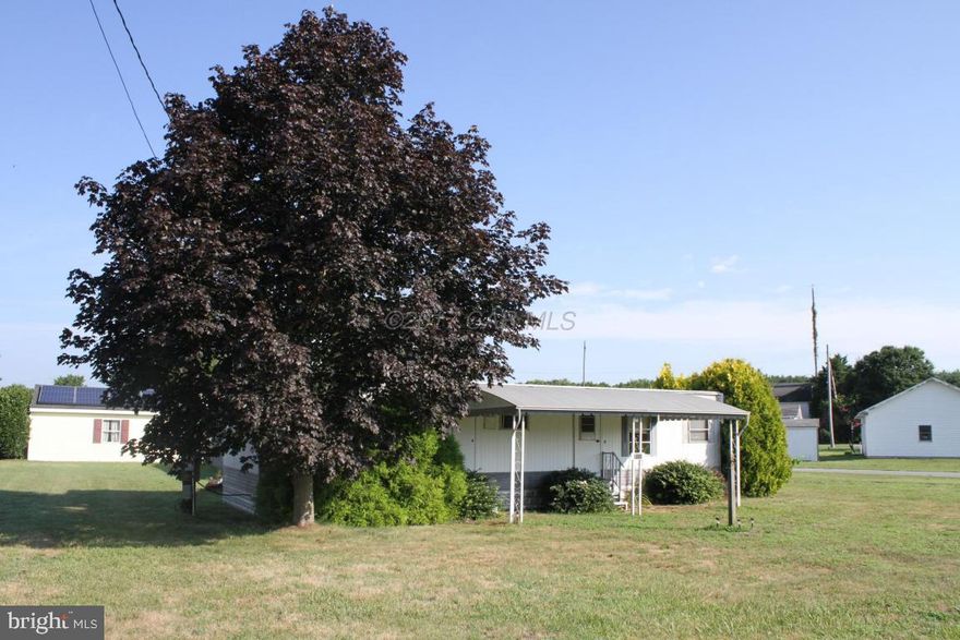 Do you have a vision?? I need a little TLC and a few minor repairs to make this 2 bedroom, 1 bath house a home. Property is conveniently located between Salisbury and Ocean city. Situated on a cleared .31 acre lot. Property features a large, detached 3-car garage with an extra storage area. Located in small town of Pittsville with only a 20-minute drive to Ocean City. Bring your imagination and have your very own ''tiny'' house on your own land! Great deal!!