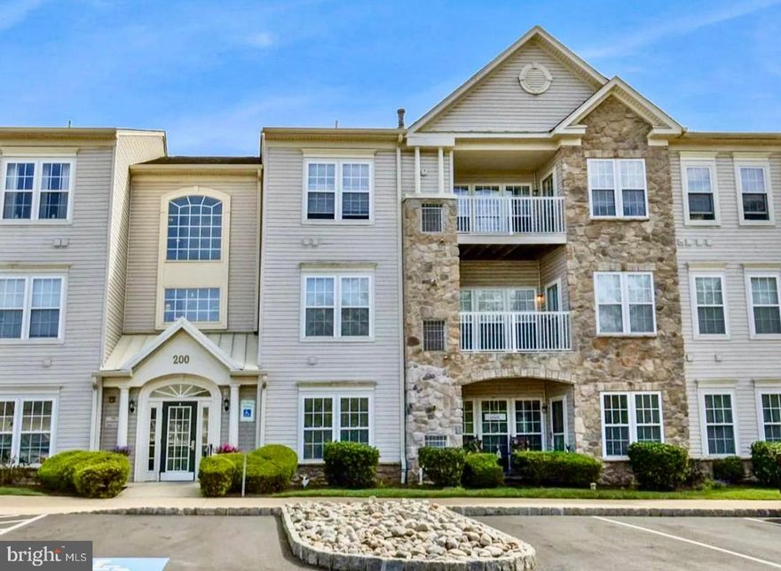 Welcome to the sought after 55+ Community of Forest Ridge located in Warrington Township. Forest Ridge is impeccably maintained, visually pleasing, and situated near all the wonderful shopping Warrington has to offer. Check out the interior of this unit! You can access this unit through a security door in the main lobby and choose between the elevator or the stairs. Many updates have been made including a carefully selected paint palette, recessed lighting in the kitchen and living room, ceiling fans in the bedrooms, updated lighting in the sunroom, and new bedroom carpeting. 9' high ceilings accented by crown mouldings. Engineered hardwoods really make the living room, dining room, and kitchen stand out along with the abundance of windows which were fit with custom window treatments!  The kitchen is in like new condition! Corian countertops, matching appliances, an oversized kitchen sink, and is open to the living room. The kitchen also houses a pantry and a second closet for the washer and dryer. The layout of this home is well appointed. The HVAC was recently serviced. The main bedroom is sunny and includes 2 closets with one being a walk-in closet. Inclusive to the main bedroom is a full main bath with a newer walk in shower. The second bedroom is wonderfully sized and equipped with a closet and access to the hall bath. You can appreciate the amount of closet space found in this home including the walk-in foyer closet. If you enjoy going on walks for your daily stroll, a walking trail can be found on the left side of the community. What a wonderful place to call home!