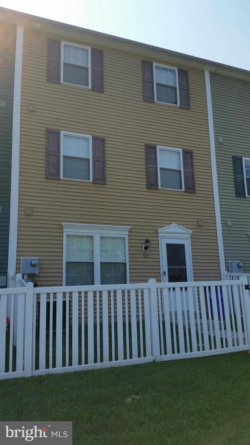 Spacious and Light Filled Townhome. Main level with Large family room just off the kitchen, Kit with pantry and good storage space. Level 2 has 2 large bedrooms and full bath down the hall. Washer and Dryer also on this level. Entire top level is the master suite with full bath and 2 very large walk in closets. Lots of parking and visitor parking. Close to shopping and only mins from rt. 15.