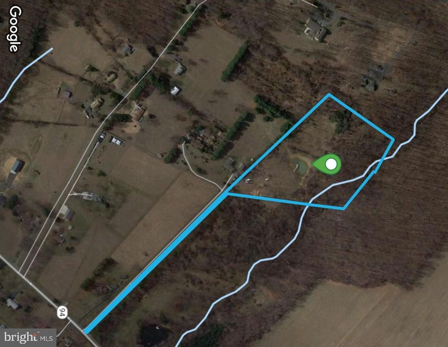 Great investment in Western Howard county. This 10 acre lot has a pond with a dock in the middle of the property. The property has so much potential. You can build your dream home overlooking the pond and build a shop for your business. The property has a conditional use for a landscape contractor  yard with a max. of 15 employees. The conditional use has expired but still possible.  Or you can subdivide the property into  (2) 5 acre lots. The perc tests are all approved and signed with the county. The lot is extremely private and surrounded by mature trees. The location is minutes off of Interstate 70. This property is a must see rare property. Call Chuck Zepp for a private showing