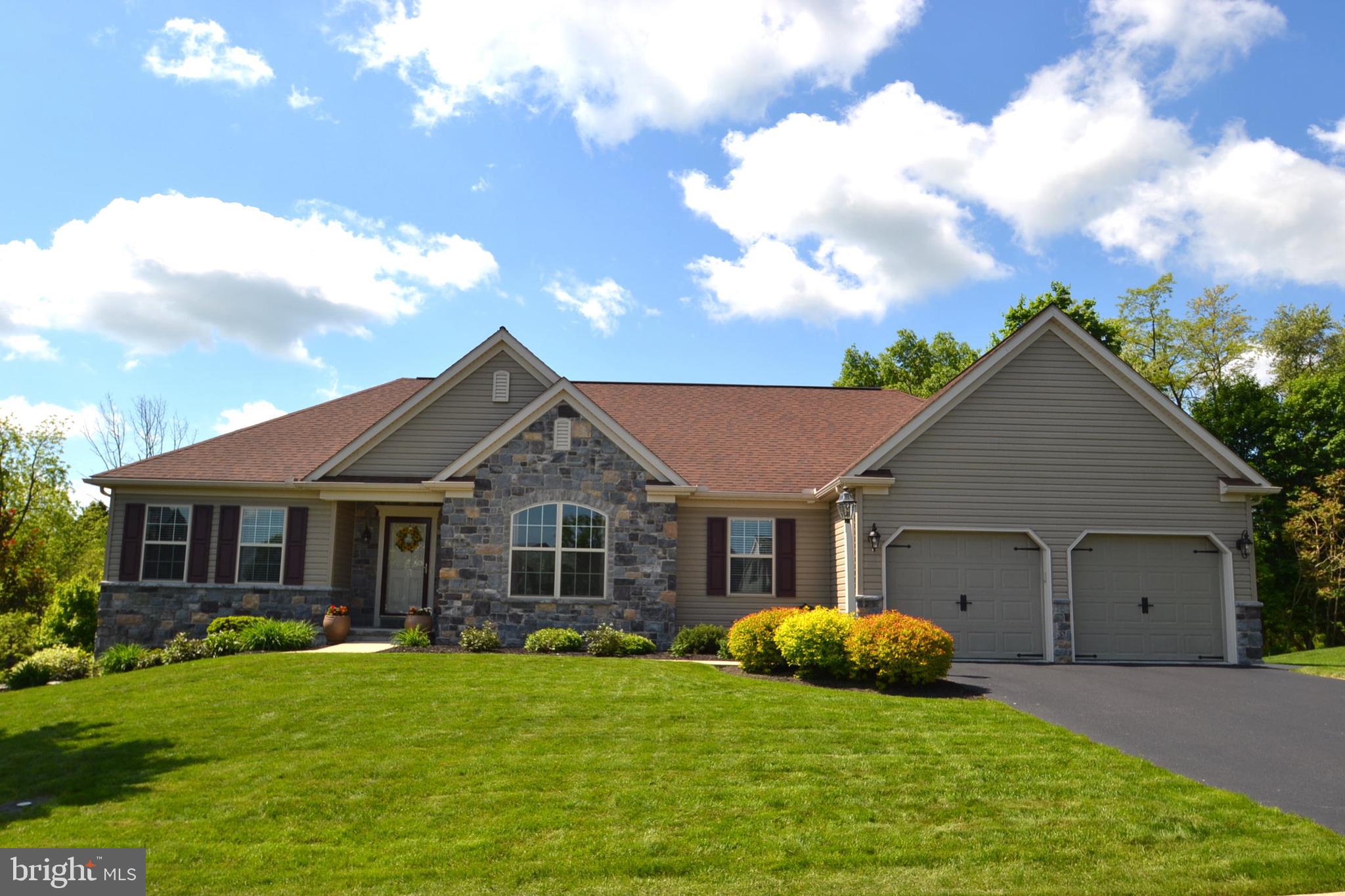 One story living at its best describes this custom-built Ranch Home on peaceful setting.  Located in popular Village Glen Community, West Hanover Township this approximately 3,500 Sq. Feet of total living space home features everything that you would expect and more. When you enter, the open layout immediately draws in the most discriminating buyer with an eye for design. This magnificent floor plan features a Gourmet Kitchen accented with an abundant amount of solid wood cabinets, center island, full appliance package to remain and large Breakfast Area with sliding glass door leading to the maintenance free 17  x 12  Trex Deck. Immediately off the Gourmet Kitchen is the Grand Great Room with vaulted ceiling, stunning gas burning stone fireplace and large triple window offering lots of natural lighting.  Entertain in the Elegant Formal Dining Room with decorative wood columns and hardwood flooring. 18  x 17  Master Bedroom Suite with vaulted ceilings, walk-in closet, door leading to Trex Deck and Master Bath with Custom Shower with ceramic title surround and glass enclosure. Two additional wonderful size Bedrooms with easy access to Main Bath with double basin vanity and tub/shower combo. First Floor also features Guest Bath, Laundry Room with utility sink & shelving. The walk-out finished lower level features a 46  x 24  Family Room with gas fireplace and pool table to remain with custom light. Lower level also offers an Office, 13  x 13  Bonus Room, lots of closet space and a 26  x 20  Storage Room. With Impeccable attention to detail and a great indoor/outdoor flow this is truly a place to call home.  Please call today for your private tour and see how much more this award winning E.G. Stoltzfus Custom Home has to offer.