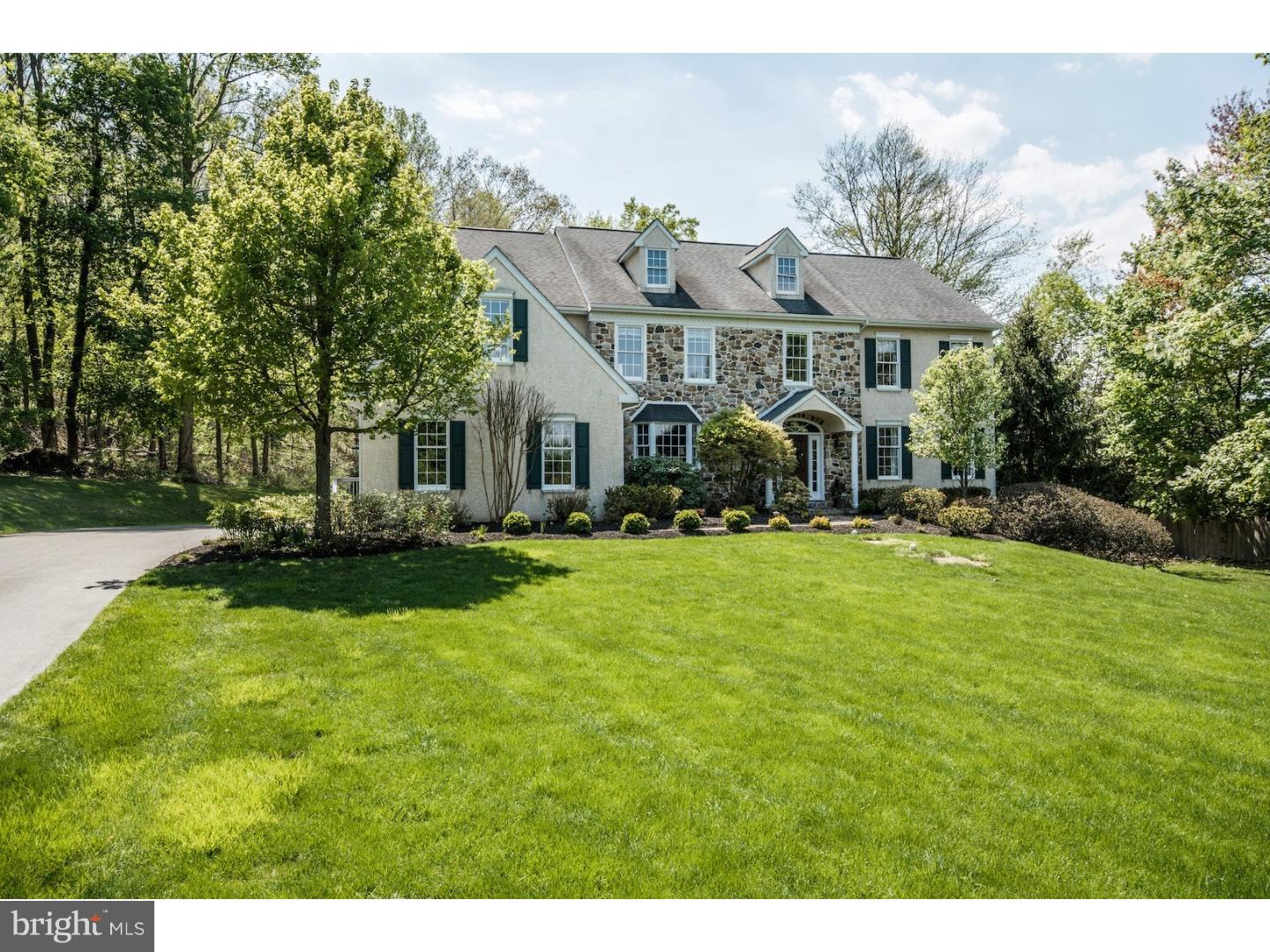 Breathtakingly exquisite is the best way to describe this custom-built executive-style home.  Take note of the handsome exterior with rich stone accents as you make your way to the entrance of your new home. Once inside, a grand two-story foyer welcomes you and your guests. Meandering through, you'll see the charming living room offers a delightful backdrop for chatting and catching up with visitors. Standing in the dining room, you will discern how it will be the perfect place to make memories as you gather with friends for years to come. The chef of the household will delight in the recently updated kitchen, complete with new granite counters, new designer, top-of-the line stainless steel appliances, and gorgeous custom cabinets. French doors brilliantly marry the indoor and outdoor spaces. At the end of the day, unwind in the great room with a cup of tea and a good book as you curl-up in front of the wood-burning fireplace. Working from home is a breeze in the main-floor study complete with fireplace and striking built-in cabinetry. The convenience of two powder rooms completes your main floor living area. As you wind your way up the front or back staircase, you are greeted by the Forbes professionally decorated master suite, certain to provide you with your perfect retreat. Tucked away inside you'll find a cozy sitting room where you can ease into your day enjoying your morning coffee. Unpacking will be delightful as you fill the fabulous his-and-hers closets, boasting smart custom-cabinetry. Let all your cares go as you relax in the spa-like master bath featuring a tranquil whirlpool tub. A princess suite with private bath and two additional bedrooms, serviced by a Jack 'n Jill bath, provide you with an abundance of space. Laundry day will be something to look forward to when you see the one-of-a-kind laundry room offering custom cabinetry designed with flair. The abundant features of this home don't stop there . . . No more expensive gym memberships-enjoy the comforts of working out in your very own exercise room, housed in the finished basement.  This space doubles as an entertaining mecca, complete with bar and gathering space.  The party continues outside on the spacious deck and the sparkling in-ground pool.  Enjoy the beauty of Chester Springs as you're surrounded by 2.5 lush acres on a private cul-de-sac lot.  The possibilities of this home are endless . . . a home that is comfortable and inviting and maintains a sense of livability.