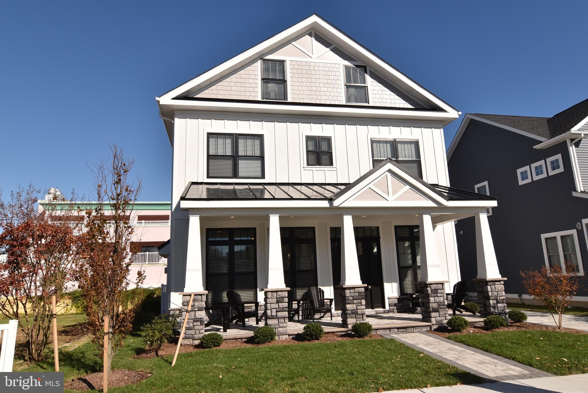 Brand new for 2019, this Ocean Block home with an inground pool is a rare find in the City of Rehoboth. This magnificent 2,500sqft beach house is only 200 feet from the beach and boardwalk. Tons of outdoor space to take in the sights and sounds of Rehoboth Beach from the front porch, rear patio/pool or the second floor deck. The spacious well thought out great room has incredible attention to detail such as exposed beams, stacked stone gas fireplace, 75in Smart TV and sustainable hardwood floors that carry throughout the entire house. The open floor plan is tied together perfectly with 10 ft ceilings, Anderson windows and gorgeous craftsman trim everywhere you look.Cooking dinner for all of your guests will be a delight in the chef s kitchen with quartz counters, stainless steel Thermador appliances, 48 inch gas range and oversized French door refrigerator/freezer. All 5 of the spacious ensuite bedrooms feature tiled bathrooms with frameless glass showers. The third floor suite is embellished with exposed beams and a cathedral ceiling. The home is being sold fully furnished including all 6 of the oversized mounted TVs. This home truly has it all; a sunken laundry room, pantry closet, easy access to a conditioned crawl space, split system HVAC and 2 tankless hot water heaters. Exterior features include a paver front porch, backyard paver patio with pool, privacy fencing, outdoor shower, Hardy Plank siding and stone, composite decking, irrigation system and parking for 2 cars.This South Rehoboth masterpiece is only steps to the ocean, 2 blocks to Rehoboth Avenue and a quick stroll to shops and restaurants. For investors, the location and high end features of this superb home will attract highly desirable rental clientele as well as potentially generating an estimated rental income of over $150,000. Ask your agent for more info about this wonderful home.