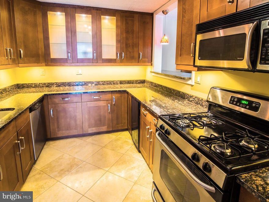 GORGEOUS  Deluxe 1 BR/BA w beautiful Chef's kitchen and even including a wine fridge!  New bath.  Brazilian cherry wood floors throughout. .Assigned Garage pkg. Resort-type amenities on new arcade level: indoor/outdoor pools, gym, Pilates studio,  cafe, market, lounge, game room. Lighted tennis courts, new gas grills, electric car-charging  stations, . 24-hr concierge, 24-hr security. Guest suites. Ride-on bus. . All utilities included.  NO smoking building.  NO pets. Vacant.