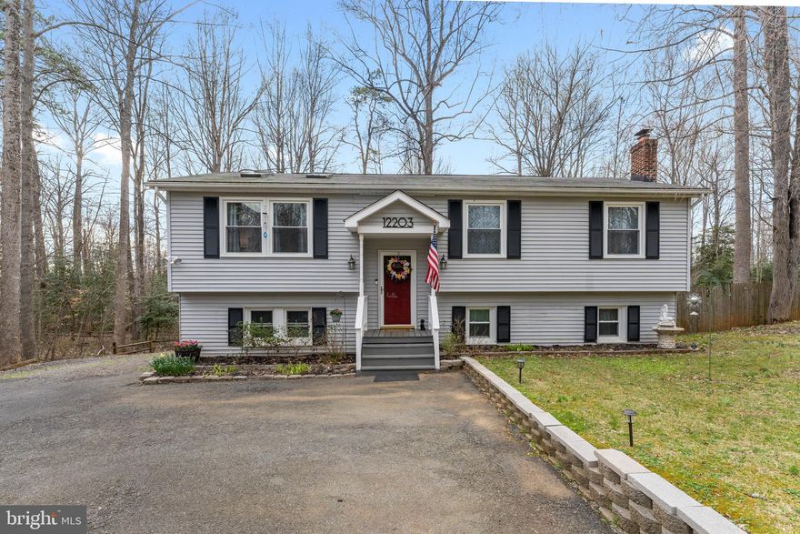 Beautiful home in park-like setting!  This well-maintained home sits on a private, ¾ acre lot in the amenity filled Lake Wilderness community.  The upper level is bright and open withthree skylights and includes a spacious living room, kitchen, dining space plus three good-size bedrooms.  The lower level offers a rec room, bonus room (currently used as a bedroom (NTC) and large den with outdoor access.  Two full bathrooms and a spacious, wrap around storage area under the stairs complete the house floor plan.    Additional storage can be found in the storage area hidden under the large deck.  The flat backyard is fenced in.   The front yard is wooded as well as the back yard.  The long, asphalt driveway provides plenty of parking for your guests.  Lake Wilderness amenities include:  pools, tot lots, volleyball/tennis/basketball courts, club house, and picnic area as well as the lake.   Professional photos coming soon.