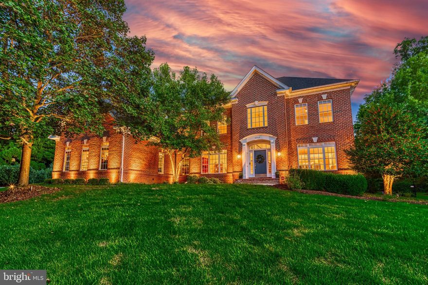 Welcome to a pristine Westport II model, by Mitchell & Best, located in idyllic River Creek,  a gated golf course community. Fully remodeled with over $300K in meticulous upgrades, including a new roof, every detail has been thoughtfully considered to blend comfort with sophistication.   The well-conceived floor plan allows for a seamless flow and is enriched by freshly stained hardwoods, intricate moldings, artisanal trim, upgraded lighting fixtures, designer Serena and Lily wallpaper, and Somfy motorized blinds.   The gourmet kitchen is designed for every culinary enthusiast, with ample storage in the upgraded 42" cabinets and the striking Virginia Black Granite countertop on the oversized island. With seating for six and a 6-burner range with retractable downdraft, the island will be the place to create delicious meals or entertain guests. The kitchen is outfitted with premium GE Monogram appliances, merging high-end luxury with everyday functionality. The space is complete with a coffee bar and walk-in panty.  The inviting family room is anchored by a gas fireplace surrounded by handcrafted, custom cabinetry, and large windows that cascade natural light throughout the space.  Unique to this home, is the spacious and well-organized mudroom with cubbies and custom-built closets. The space is paired with a Butler’s pantry to grab snacks or beverages on the go with pebble ice! The main level also includes a private home office, elegant dining room, and formal living room, connected by a light-filled two story foyer.   Ascend to a thoughtfully designed upper level, featuring four bedrooms and remodeled bathrooms. The primary suite is a sanctuary, complete with a step-down sitting room that shares a two-sided gas fireplace, offering a warm ambiance throughout.A true retreat, the space includes dual walk-in closets, a charming Juliet balcony, and a lavish spa-inspired bathroom featuring a jetted tub, separate vanities, and an oversized walk-in shower. Two bedrooms share an updated Jack and Jill bathroom while the Princess Suite boasts a private bathroom and a generous walk-in closet.  The finished walk-up basement enhances the home's entertainment space, providing an expansive recreation room and a cozy lounge area ideal for socializing. Fitness enthusiasts will appreciate the dedicated workout room, while a multipurpose room offers flexibility for hobbies, a home theater, or a space for guests. Two generous storage rooms ensure that everything has its place, keeping the entire space organized and functional. This lower level is designed to cater to all aspects of entertainment, leisure, and practical living, adding immense value and versatility to the home.  The oversized, three-car side-load garage is equipped to meet all your needs, featuring a built-in vacuum system, a heater and a fan for year-round comfort.  There is ample space for tools, equipment, and seasonal items, while a designated area accommodates a golf cart with ease. This thoughtfully designed garage blends practicality with convenience, ensuring it functions as a versatile and efficient extension of the home.  The captivating outdoor space features a serene enclosed porch, an expansive Trex deck, and a fire pit for fall evenings beneath the stars—making this home ideal for creating cherished memories. The nearly half-acre lot is beautifully landscaped, enhanced with landscape lighting, and includes an underground 13-zone irrigation system, conveniently managed at your fingertips via a Rachio app.  River Creek’s amenities include Confluence Park with sports courts, a playground, picnic areas and a dock for launching watercraft for a day on the Potomac River.  Residents also have access to the Club's six tennis courts and may purchase a golf membership to enjoy the Ault-Clark designed golf course, adding to the abundant amenities of this community!! Open House Thursday 10-10 from 4-6pm!