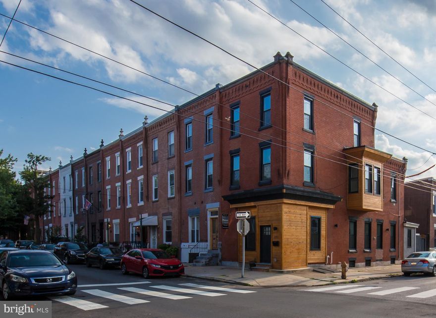 Absolutely incredible bright and wide renovation in a prime Fairmount location! Enter this spacious corner home into the awesome large open concept living room/ dining room with a wall of large bright windows, soaring ceilings, incredible unique details, stunning light wood floors, exposed brick, and three exposures! Fantastic large kitchen with tons of beautiful counter space, extra large island and stainless steel appliances. First floor powder room and yard space. The second floor features three large bright bedrooms and an absolutely beautiful hall bath with double sinks and tub.Sun drenched third floor master bedroom suite with tons of closet space and exposed brick. Gorgeous bathroom features an extra large glass shower with rainfall shower head, double sinks, and beautiful tile work. Door to roof with potential for large deck (permits in place). Extra large clean basement provides ample storage space. Must see to appreciate this wonderful space and gorgeous finishes! 10 year tax abatement pending.