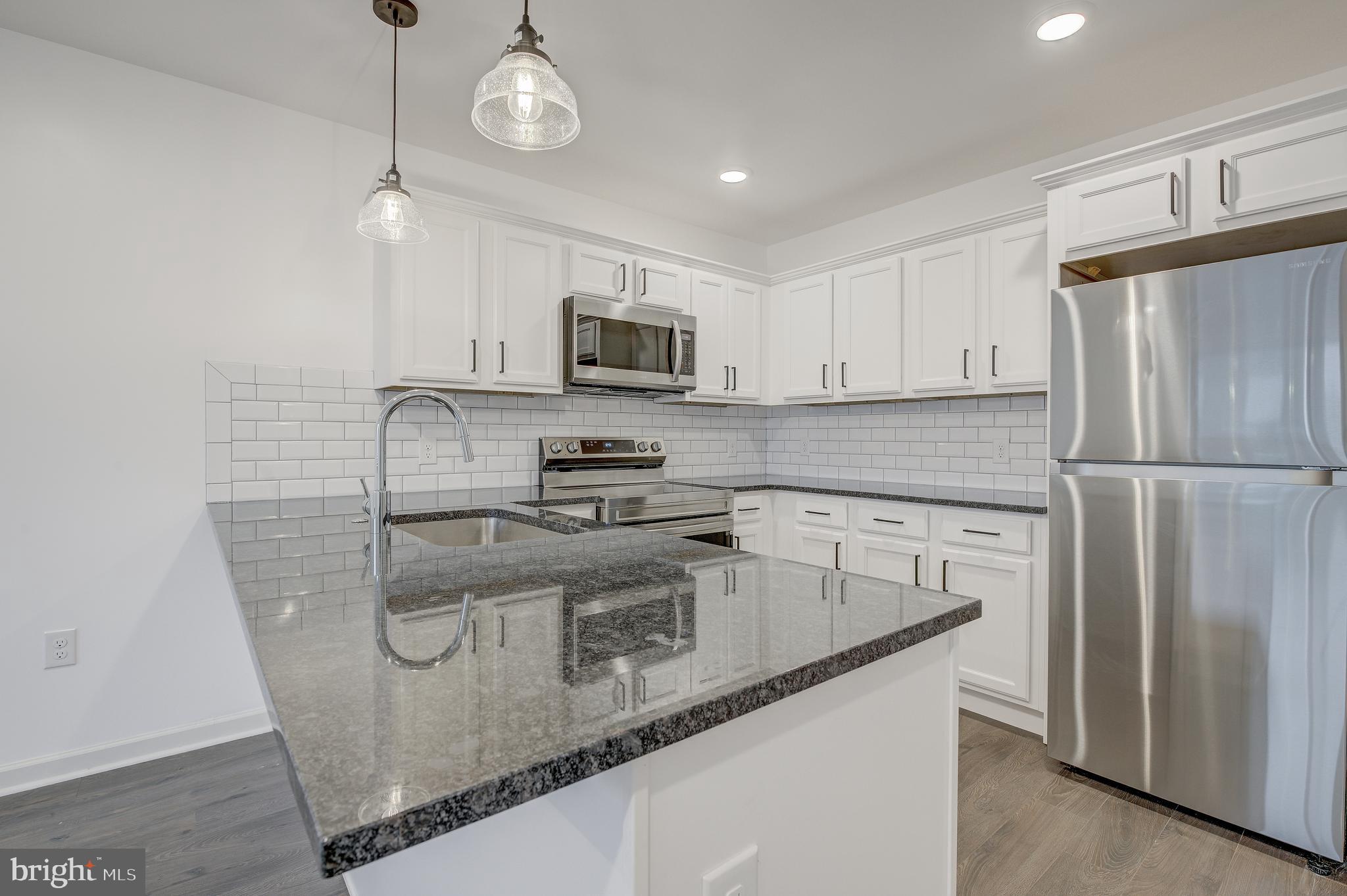 Available June 1st! Modern & Spacious one-bedroom coming available in a brand new construction apartment community. Located along Roxborough's vibrant Ridge Avenue corridor, convenient to shopping, dining, transit, and more! Your new home includes easy-to-clean vinyl wood plank flooring, custom granite countertops, and large windows that let in tons of natural light. Stacked washer & dryer in the apartment with dishwasher & garbage disposal make chores a breeze! Stay comfortable year-round with individually controlled PTAC Climate Control in each room. All residents at Lilac Pointe can access the green roof deck, resident lounge, and fitness center for no additional charge. Plus, we are pet friendly with NO FEES! Apply today- this home will not last long!