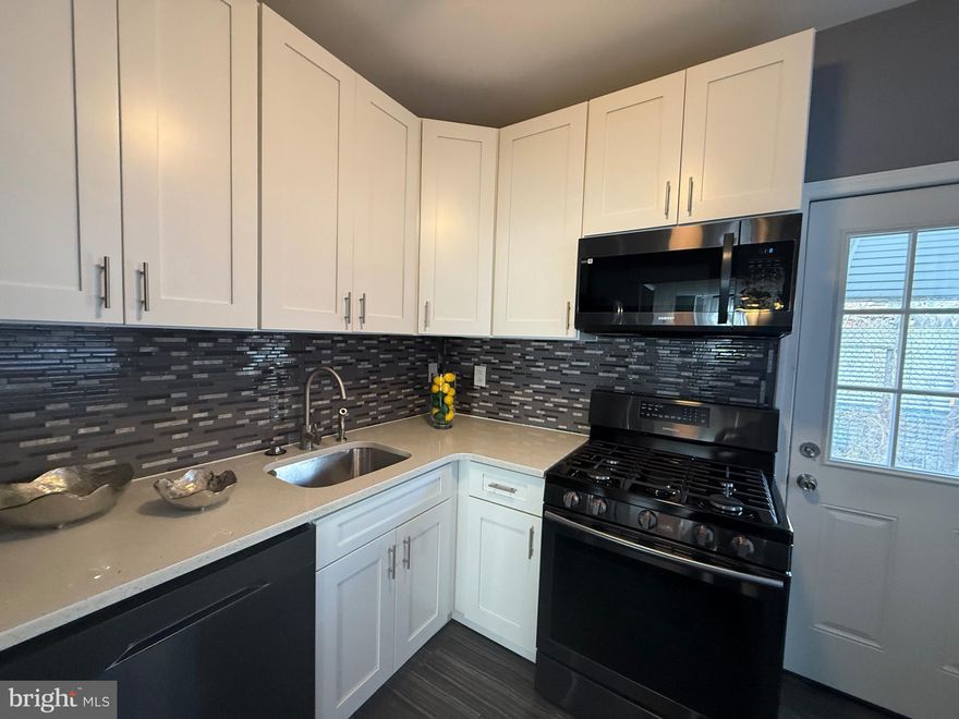 Welcome to this beautifully updated 3-bedroom home in the vibrant Port Richmond neighborhood of Philadelphia. Thoughtfully renovated, this residence combines modern convenience with timeless charm.
Step inside to a bright and airy living room filled with natural light—perfect for entertaining guests or simply unwinding after a long day. The remodeled kitchen impresses with crisp white cabinetry, sleek black stainless steel appliances, and durable quartz countertops, offering both style and functionality for everyday cooking and special gatherings.
The modernized bathroom features fresh finishes and a clean, relaxing design. Upstairs, you’ll find three  bedrooms, each with generous closet space to keep everything organized.
Major recent upgrades include a brand-new roof and a new sewer line, giving buyers peace of mind and long-term value. Outside, enjoy a private concrete patio, ideal for outdoor dining, container gardening, or simply relaxing in your own quiet retreat. With its prime location near shopping, dining, and public transit, this home offers excellent walkability and easy access to everything Port Richmond has to offer.
Don’t miss your chance to own this beautifully renovated, move-in-ready gem!