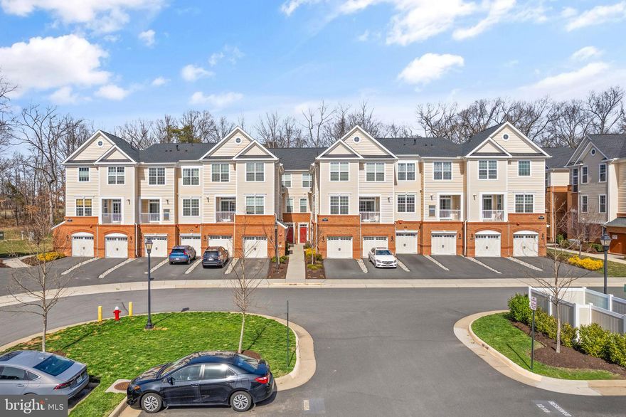 OPEN HOUSE CANCELLED! Welcome home to this gorgeous townhouse style condo in Ashburn's Loudoun Valley!  This 2020 built unit is fully move-in ready and has everything that you're looking for.  With 2 bedrooms, 2.5 bathrooms, and just under 1600 square feet, space is no question!  Outside you'll see a beautiful exterior complete with an extra-large 1 car garage AND AN EXTENDED DRIVEWAY capable of hosting an additional vehicle.  Inside you'll find a fantastic main level that boasts a wide-open floor plan with an oversized living room, formal dining area, and a gourmet white kitchen that rivals most single family homes!  It's complete with a built-in pantry cabinetry and a large island with space for barstools!  Heading upstairs you'll find two spacious bedrooms, including a naturally lit primary suite with 2 closets and a lovely primary bathroom.  The icing on the cake is the location - Loudoun Valley is centrally located and close to shopping, schools, public transportation, and feeds to the Rock Ridge HS pyramid.  Come see this one for yourself!