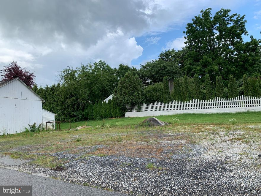 Affordable .23 acre lot in Littlestown convenient to shopping yet not on the main road!  Check with the Borough for details on Public water and sewer hook-up.   Existing storage barn on lot is included as is.  Bring your Builder of Choice and check out this lot today!