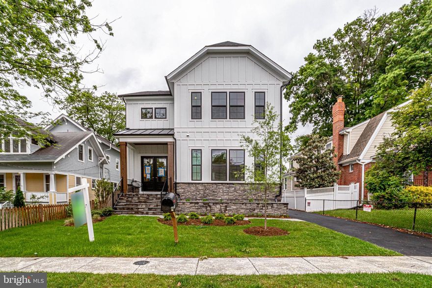 Ladies and Gentleman...Introducing THE ROCKINGHAM II with the NEW 2 CAR CARRIAGE HOUSE Garage.  And, it is such a short walk to the East Falls Church Metro Station or Benjamin Banneker Park and Dog Park, you won't care which is closer.  This is a Unique Must-See Arlington property and Open Houses on the weekends.

This Rockingham is 4853 total SF and comes with the Main Level Guest Suite option.  In addition, the Detached 2 Car Garage Carriage House has a Guest Suite above with Full Bath, small Refrigerator, and a Wet Bar with Dishwasher.  

The Main House has all the popular trimmings with  Board and Batten Front, Black Trim Gutters, Black Porch Rails, and Black Garage Doors, Cedar Front Porch Columns, Flagstone Water Table, Flagstone Porch, Flagstone Leadwalk, and Black Trim Windows.  Inside you'll find a wide open floor plan on the Main Level with 10 ft ceilings, black frame windows inside as well, Deluxe Kitchen with White Stacked Cabinetry, Navy Island, and Pot Filler, modern Fireplace mounted on Shiplap wall, Modern Design Stair Rails, and Large Dining Room. Upstairs are 4 BRs with 3 BAs that have upscale custom tile, plumbing fixtures, and lighting.  The MBR has a tray ceiling and huge Closet and MBA has Frameless Shower Doors with huge 24x24 in tile flooring.  The Basement is filly finished with Wet Bar, BR, and full BA.  The Carriage House Garage also carries the upscale finishes up to the Guest Suite including under Cabinet lighting.
  
There is a whole house fan on the second level with ability to improve the air quality within the entire home, 2x6 Framing, a âbest in the businessâ 10 year transferable warranty, pest tubes in walls, and other standard quality features. Quality is not expensive, itâs priceless!