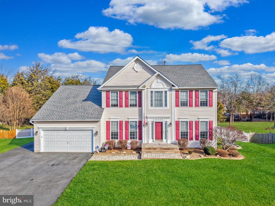 Beautifully upgraded home located in a vibrant Fredericksburg community.  A total of 4112 SF including the unfinished basement! The open main level flows seamlessly into a warm family room featuring a custom built-in entertainment center and gas fireplace. Custom Roman shades adorn the windows throughout the entire home. Enjoy  year-round relaxation in the screened-in sunroom with Trex flooring, which opens to a paver patio, grill gazebo, and matching second lower Trex deck—perfect for effortless indoor-outdoor living.

The main level also includes a dedicated office, powder room, and laundry room, washer and dryer convey. The custom garage is a dream for hobbyists. In the garage you will find Closets by Design cabinetry, slatwall storage, golf organizer, workbench, flex tile flooring, and a smart garage door opener with battery backup.

Upstairs there are four spacious bedrooms. The luxurious owner’s suite boasts vaulted ceilings, dual walk-in closets, and a spa-like bath with quartz-topped dual vanities, a frameless glass walk-in shower, and a deep soaking tub. New top grade carpeting with upgraded padding installed in 2023 throughout the upper level, stairs and family room.

The full unfinished basement provides space for a home office and game room, along with rough-in plumbing for a future bathroom, offering endless expansion potential.

Additional upgrades include a dual-zone thermostat with dampers, whole-house generator (2022), whole-home surge protection, vinyl fencing with dual gate and two single gates, professional landscaping, inground sprinklers, termite traps, Ring doorbell, and a 10x10 shed. Major system updates include roof (2024), driveway (2020), AC (2018), furnace (2017), water heater (2018). Professionally painted interior throughout (2024-2025).

Thoughtfully elevated and impeccably maintained, this exceptional home is ready to welcome you—schedule your private tour today.