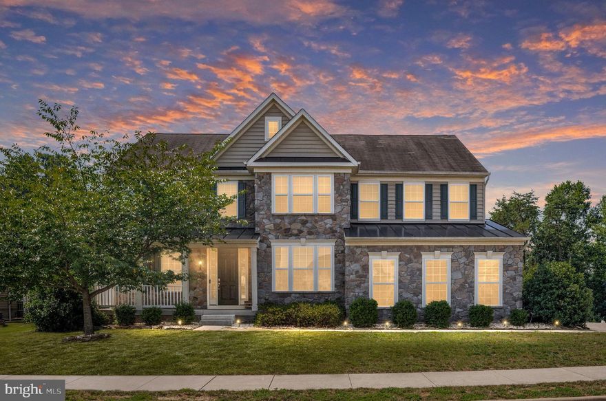 Welcome to this beautifully maintained 5-bedroom, 4.5-bathroom home in the highly sought-after, amenity-rich community of Lees Parke. Ideally located just 8 miles from the Spotsylvania VRE station and perfectly positioned between Richmond and Washington, D.C., this property offers the ideal blend of comfort, space, and convenience.

Step inside to discover a bright and open floor plan that perfectly balances style and function. The gourmet kitchen is a chef’s delight, featuring granite countertops, a large center island, abundant cabinetry, and stainless steel appliances. It flows seamlessly into the expansive family room and sun-drenched morning room—perfect for gatherings or quiet mornings at home. Working from home? You’ll love the dedicated main-level office with French doors and ample natural light.

Upstairs, retreat to the luxurious owner’s suite, complete with a spa-inspired bath and generous walk-in closet. Three additional bedrooms and two full baths offer flexibility for family or guests—one bedroom even includes its own private en suite. A convenient second-floor laundry room keeps daily chores a breeze.

The finished walkout basement adds even more living space, featuring a fifth bedroom, full bath, and a large recreation area—ideal for a home theater, fitness studio, or multigenerational living. Step outside to a private backyard with serene views of mature trees and landscaping.

Enjoy relaxing or entertaining on the spacious deck, or explore all the community has to offer—swimming pools, walking trails, playgrounds, tennis and basketball courts, and more. The side-load 2-car garage enhances curb appeal and adds functionality.

This move-in-ready gem offers easy access to major commuter routes, shopping, dining, healthcare, and so much more!