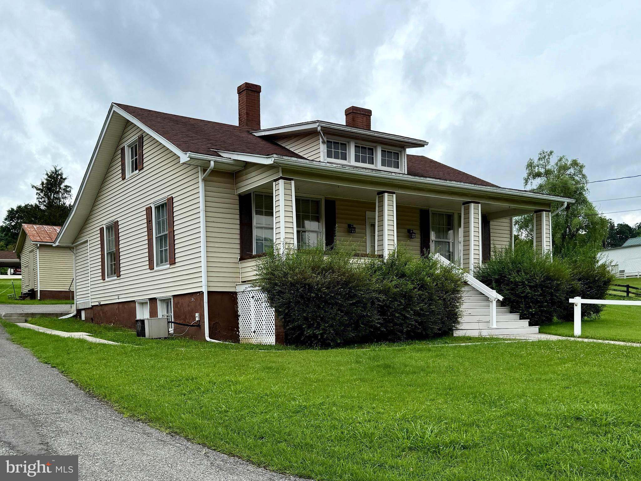 Formerly used as an office, the layout easily accommodates RESIDENTIAL LIVING or PROFESSIONAL SPACE with minimal updates. This 3 bedroom, 2 half bath home with over1500 finished sq ft offers timeless charm and versatility in a peaceful setting in the small town of Franklin, WV. The home features a welcoming front porch and a bright, spacious living area complete with a cozy fireplace-perfect for relaxing or hosting clients in comfort. The kitchen, ready for customization, currently has no appliances, allowing the new owner to design it to suit their personal taste or business needs. The property sits on a generous, beautifully manicured lot with mature landscaping, sweeping green lawn and lovely mountain views. A detached outbuilding offers additional space ideal for storage, a workshop, or conversion into a studio or guest quarters. Whether you are seeking a permanent residence, short term rental or a professional office with charm and character, this property presents a unique opportunity in a desirable location within walking distance of town.