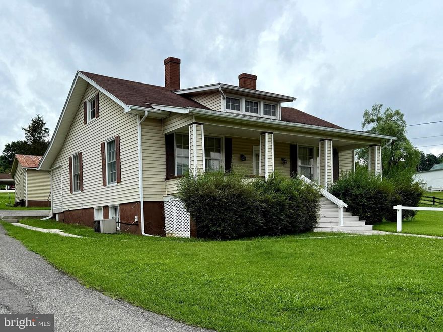 Formerly used as an office, the layout easily accommodates RESIDENTIAL LIVING or PROFESSIONAL SPACE with minimal updates.  This 3 bedroom, 2 half bath home with over1500 finished sq ft offers timeless charm and versatility in a peaceful setting in the small town of Franklin, WV. The home features a welcoming front porch and a bright, spacious living area complete with a cozy fireplace-perfect for relaxing or hosting clients in comfort.  The kitchen, ready for customization, currently has no appliances, allowing the new owner to design it to suit their personal taste or business needs.  The property sits on a generous, beautifully manicured lot with mature landscaping, sweeping green lawn and lovely mountain views.  A detached outbuilding offers additional space ideal for storage, a workshop, or conversion into a studio or guest quarters.  Whether you are seeking a permanent residence, short term rental or a professional office with charm and character, this property presents a unique opportunity in a desirable location within walking distance of town.