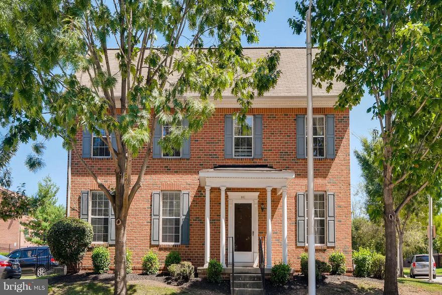 Enjoy Charm City living at its finest in this beautiful & Spacious all brick duplex situated on a lovely corner lot in Heritage Crossing.  Master BR w/ walk-in closet & full bath, 2 sizable BR on upper level, new laminate fls on 1st & 2nd fl, updated HVAC & Hot water, off street parking, 1 year home warranty included!