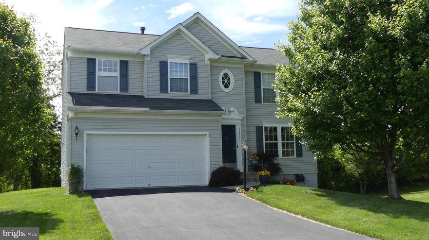 Besides style and charm this pristine colonial has 4 bedrooms, 2.5 baths, Gleaming wood floors, gas fireplace, open kitchen w/ granite counters & Cherry Cabinets, New carpet upstairs, full unfinished basement, large custom TREX Back Deck. Serenity is the mood of this beautiful back deck w/ custom canopy. Great for entertaining and enjoying nature. Patio below the deck is covered sorain does not dampen your party. Full unfinished basement w/ doors to the patio & plumbed for a full bath – ready for expansion. Nest Smart Thermostat & Doorbell and outdoor security cameras. The 2-car attached garage has Smart garage door opener & expanded overhead storage system. All this is in the much-desired Gordonsville Gates community.
