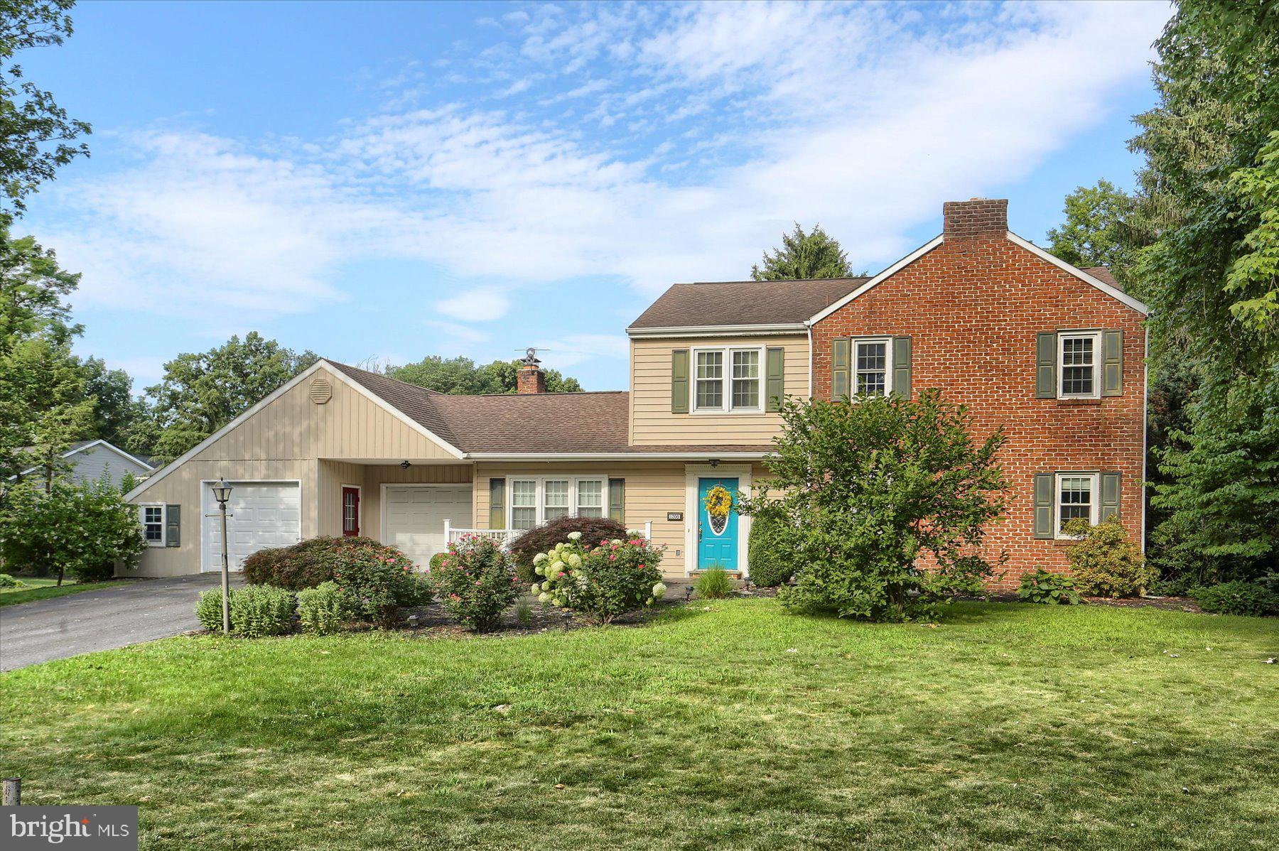This 2342 sq. ft., 2 story 3-4 bedroom, 2 1/2 bath home rests on a corner .33 acre lot. located on the southwest corner of the 2nd block of Sadler Drive. Stepping inside the front entry door onto the ceramic tiled floor of the foyer of the home you must decide whether to travel up the staircase to the left of the over 7' wide foyer to the solid oak flooring of the upstairs bedrooms -or- take the foyer hallway straight to the rear of the home hallway, or turn right. Turning right you enter the large 27' X 14' solid oak flooring of the formal living room. The gas corner fire place to your left as soon as you enter provides the ambiance and added heating if needed to the newer heat pump installed in the home. At the far end of the living room you pause and turn left into was once the formal 13' X 14' the dining room again with solid oak flooring. The current owners removed a wall between the dining room to the kitchen to provide a more open feel of the home area. At the rear of the dining room area you access the remodeled kitchen with ample cupboard space. Continuing through the kitchen and following the hallway toward the south side of the home you pass the access door to the full basement on your left which houses the newer heat pump, the half bath with laundry area on your right, and onto the carpeted family room. The family room includes the 2nd gas fireplace, front access to the outside, inside access to the 2-car garage, and rear access thru the newer rear sliding door to relax and entertain on the wonderful spacious rear pavered patio area with beautiful pergula. Taking the staircase as you enter the house to the 2nd floor, You notice the well kept solid oak flooring through out the upstairs with the exception of the upgraded hall bath with granite counter top at the top of the stairs and the primary bath with a walk in shower. Solid oak flooring extends through the hall and all bedrooms. At the top of the stairs the first bedroom to your right could be a 4th bedroom with a mini walk in closet or an office withthe built in shelves. The two bedrooms on the left as you travel down the hall have ample closet space for each of the family members. The primary bedroom to right and front right corner of the home has had an upgraded bath wiht walk in shower, a walk in closet and ample space for accessory furniture in addition to a bed. The location of this home is in the quiet subdivision of Forest Park is the last development in the southwest corner before leaving the Borough of Carlisle, located with quick access to on and off ramps North and South of I-81, the Carlisle UPMC hospital and many medical facilities in the area. As well as shopping within 10 minutes. Structurally sound with solid oak flooring of the 70's being prominent in about 70% of the home's square footage.