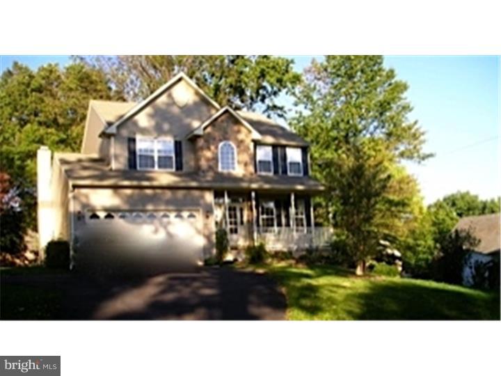 Well cared for 12 yr home that feels and looks new with many upgrades included when constructed and added recently including 9' ceilings, hardwood flooring, fire place, finished basement, built-in book shelves, granite kitchen counters, upgraded appliances practically new, built-in convection microwave, wide baseboard trim, wainscoting, crown molding, extra wide and shallow steps to second floor, box & bay windows, transom windows, double master bedroom doors, cathedral master bedroom & bath, extra big linen closets in bathrooms, remote control ceiling fan, walk-in closet, main bedroom soaking tub, stone front, keyless entry, gutter guards...and much more. Quiet street yet convenient to downtown, parks, and transportation. Sliding doors lead from eat-in kitchen to fenced rear yard encapsulating lush landscaping with EP Henry paver patio, arbor and utility shed. Quiet quaint street close to French bakery, restaurants, theater, Charter School, gas, banks, food.