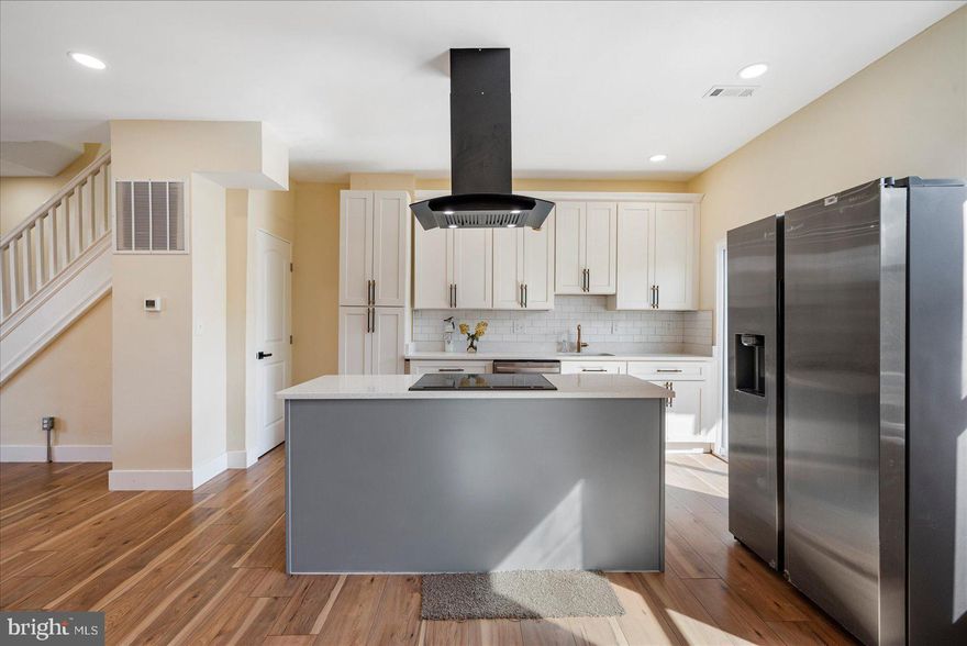 Beautifully remodeled 3BR/2BA Townhome located in the quiet neighborhood of Forest Park.  Make your way through the gated front yard, step onto a covered deck and open the door into your forever home. Step into a completely transformed main floor offering an original exposed brick wall, an open floor plan, plenty of natural light, beautiful flooring, and recessed lighting. This floor offers a large living room, dining room, and stunning kitchen.  The kitchen features mixed metals including stainless, gold and black throughout, stainless steel appliances including a slide in electric range set into an island with a ceiling mounted range hood, and quartz countertops with a tiled backsplash.  On the second floor are two sizable secondary bedrooms, one with access to a newly constructed deck that overlooks the yard below, a spacious primary bedroom, a newly remodeled full bath with a beautifully tiled walk-in shower. The lower level is finished offering additional living space featuring a full bath with a stand alone soaking tub, a family room, laundry, storage, and a walk-out to the yard.  From the kitchen, through sliding doors, step out onto a new deck that overlooks the fenced yard offering so many possibilities.  This home is move-in ready with so much to offer new homeowners, and is conveniently located in close proximity to shopping, restaurants, and commuter routes.