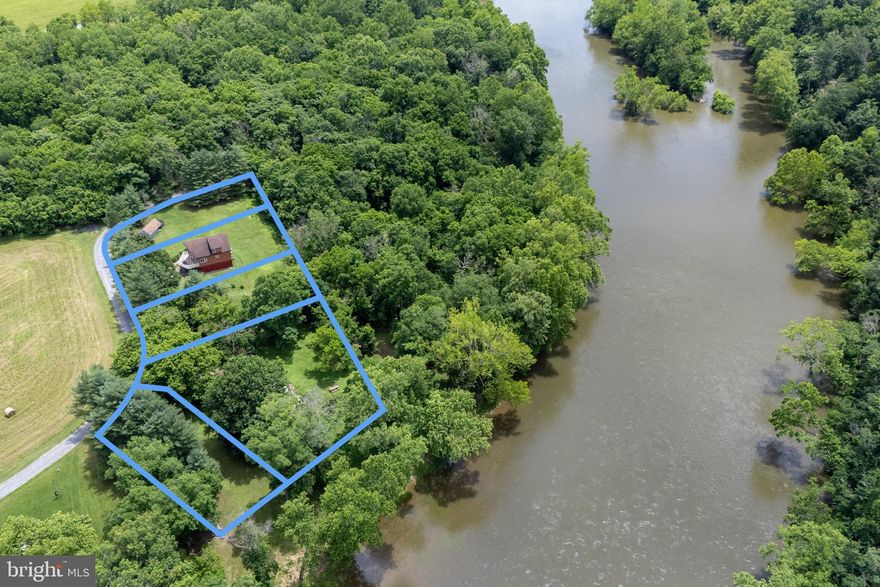 Incredible Investment Opportunity – Two active short-term vacation rentals situated on 5x separate lots totaling over 2 acres just a stone’s throw from the Shenandoah River! Welcome to The Jive Cabin and The Shuck Cabin. Both cabins are well established short-term rentals (STRs) with strong rental history and potential upside due to their prime locations with river access and close proximity to numerous other outdoor attractions. The Shuck Cabin is a stunning A-frame cabin featuring 3 bedrooms, 2.5 bathrooms, and a spacious open loft. Designed with an open-concept layout, this cabin boasts chalet-style vaulted ceilings, large windows offering river views, and stylish finishes throughout. Truly a perfect blend of cozy and modern, The Shuck Cabin invites guests to relax and unwind. The Jive Cabin is just a stone’s throw from the Shenandoah River, and has 2 bedrooms, 1.5 bathrooms, a loft, and an inviting sunroom — the perfect spot to take in the peaceful surroundings and the sounds of the river flowing by. A propane fireplace adds warmth inside, while the expansive outdoor deck provides space for enjoying the hot tub and stars in the night sky.  Also included is a sizeable storage shed for equipment storage. No active HOA! With easy access to the South Fork of the Shenandoah River and just a short drive from Shenandoah National Park, George Washington National Forest, and Luray Caverns, the location of these cabins is ideal for guests and owners seeking both adventure and tranquility. Whether you are looking to expand your short-term rental portfolio or own a private retreat in the Shenandoah Valley, this is an exceptional opportunity you will not want to miss!