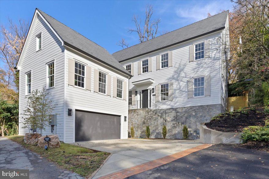 Timeless Elegance and Modern Comfort, 5002 Hurst Terrace NW, is a stunning new home in Kent. Built in 2023, it boasts 7 beds, 6 baths, and 8,000 sq. ft. of exquisite living space. Enjoy a heated pool and resort-like outdoor area. Inside, find 10-ft ceilings, oak floors, and elegant design. The open kitchen flows into the family room with pool views. A carriage house accessible from the main house with a separate entrance offers endless possibilities. Upstairs, the primary suite is a sanctuary with custom closets and a spa-like bath. The lower level features rec spaces, bedrooms, and a garage. , EV charging, fenced yard, and more! Peaceful cul-de-sac location, close to dining, shopping, and amenities.